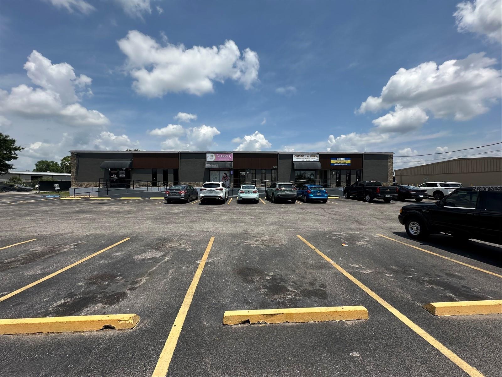 Mixed used commercial, freestanding brick building.