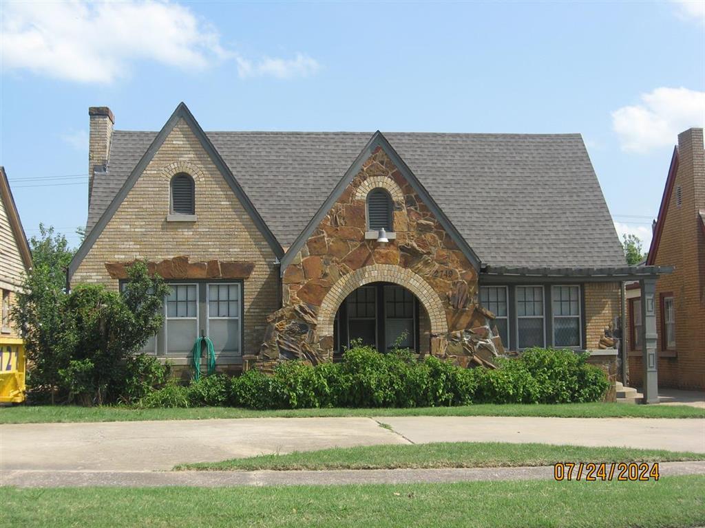 MOTIVATED SELLER!!!! NEW PRICE!! Beautiful Home + Income...Outstanding remodel in Historical Crestwood, beautiful rock arch, covered front porch with Pergola styling, gorgeous wood floors, kitchen updated with newer cooktop, flooring, subway tile, lighting and hardware; 3beds, great closets with built-in storage, 2 baths updated, main bath has built-in dressing table, newer tile, extra over-sized hallway cedar closet. Inside utility for super convenience located in bedroom section of home. Large living room and dining room (could be used as home office or bonus room), and cozy kitchen dining nook with beautiful built-in china cabinet, exquisite workmanship. This home has lots of light and character, arched walk-ways, mock brick fireplace, super storage, circle drive for extra parking and covered porch for morning and evening gatherings. Rock and brick veneer showcase this wonderful home, waiting for new owners. Garage apartment in the back or perfect guest house. Both main house and garage apartment are sold AS-IS.