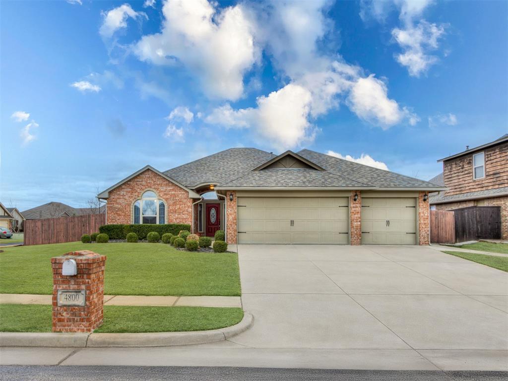 Stunning new listing in highly sought-after Deer Creek Schools, located in a small gated neighborhood just minutes from the Kilpatrick Turnpike and Hefner Parkway. This 1,861 sq ft home offers 4 true bedrooms, 2 full baths, and an oversized 3-car garage, all situated on a huge corner lot with a fully fenced backyard.  The amazing, spacious floor plan features an oversized living room highlighted by a vaulted ceiling with a wood beam and a beautiful brick corner fireplace with gas logs. The kitchen is a standout with tons of cabinetry, granite countertops, marble tile backsplash, gas stove, breakfast bar, and pantry. The oversized eat-in dining area provides plenty of room for entertaining or hosting holiday meals.  The primary suite is generously sized with a raised ceiling and mood lighting, while the ensuite bath boasts dual sinks, a jetted tub, large walk-in shower, and an enormous walk-in closet. Secondary bedrooms are thoughtfully placed on the opposite side of the home and share a large full bath. The 4th bedroom is oversized and could easily function as a study or den.  Step outside to a huge backyard with lush grass, a large covered patio, extended open patio, and fire pit area—perfect for outdoor living and entertaining. Additional updates include a new roof in 2022, all new interior paint, and brand-new carpet throughout. This home is truly move-in ready and waiting for its new owners!