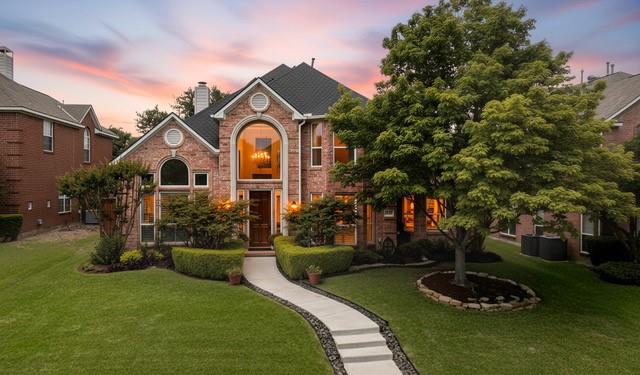 This home is built for BEAUTY & FUNCTION, nestled in quiet, desirable Russell Creek Estates. This well-maintained home, has the perfect blend of comfort, style & outdoor living. Built by Huntington Homes & still looks like a model! Dramatic vaulted ceiling entry way leads you inside this home LOADED w upgrades. Inside, find a light filled formal living & dining room w sparkling chandeliers, including a 2-sided fireplace w access to the family room. Beautifully appointed Home Office Suite (4th BEDROOM) has walk-in closet & fireplace (with 3rd full bath). Plantation shutters, freshly refinished solid oak hardwoods, & custom drapes throughout. Modern kitchen has been updated w designer light & fan, quartz countertops, under cabinet lighting, double ovens, built-in microwave & new gas range. Each bedroom offers generous space & storage with the main floor primary suite having remote control Hunter Douglas shades while boasting a luxurious bathroom with soaking tub, separate shower, his & hers walk-in closets, & double-sided fireplace. The exterior is a gardener's DREAM with auto irrigation systems for the flower beds, compost bin & rain barrels. Enjoy the best of outdoor living in your private backyard retreat with gas grill hook up making entertaining a breeze. Highly energy efficient windows with tinting & a full solar system including solar powered roof fans & radiant barrier attic (seller saves approx. $400 - $600 per month). Voluntary HOA is grandfathered in. The neighborhood has so many amenities to offer including Russell Creek Park & pond, numerous biking trails, 2 community pools, clubhouse, tennis & basketball courts, playgrounds. Award winning Plano ISD with elementary and middle schools within walking distance. Very convenient to major highways including 121, 75 and the DNT as well as many restaurants & shopping. Offering convenience and tranquility, don't miss this opportunity to call this your forever home!