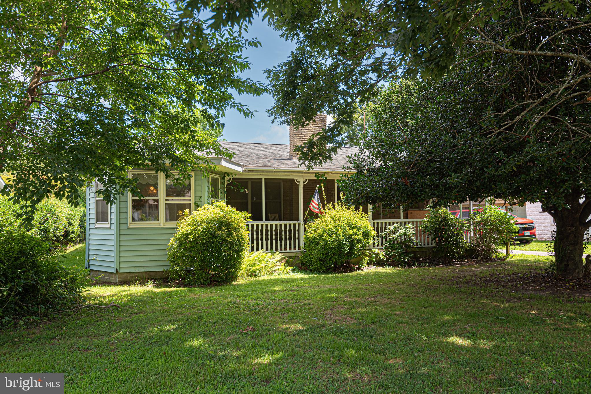 Rare opportunity to own an expansive home on 1.24 premium acres in historic Berlin Proper! This unique property backs directly to Stephen Decatur Park and features a spacious 4BR/2.5BA main house with a large country kitchen and an attached 1-car garage. A private, separate-entrance 2BR/1BA garage apartment provides immediate  guest quarters. The park-like grounds boast a pool, multiple detached garages, and ample storage for mowers, bikes, and beach toys. Located on a highly desirable street just minutes from Assateague Island's beaches and Ocean City's famous boardwalk. For ultimate privacy or development, 19 Burley is also listed for sale—buy both properties together to create your own massive estate!