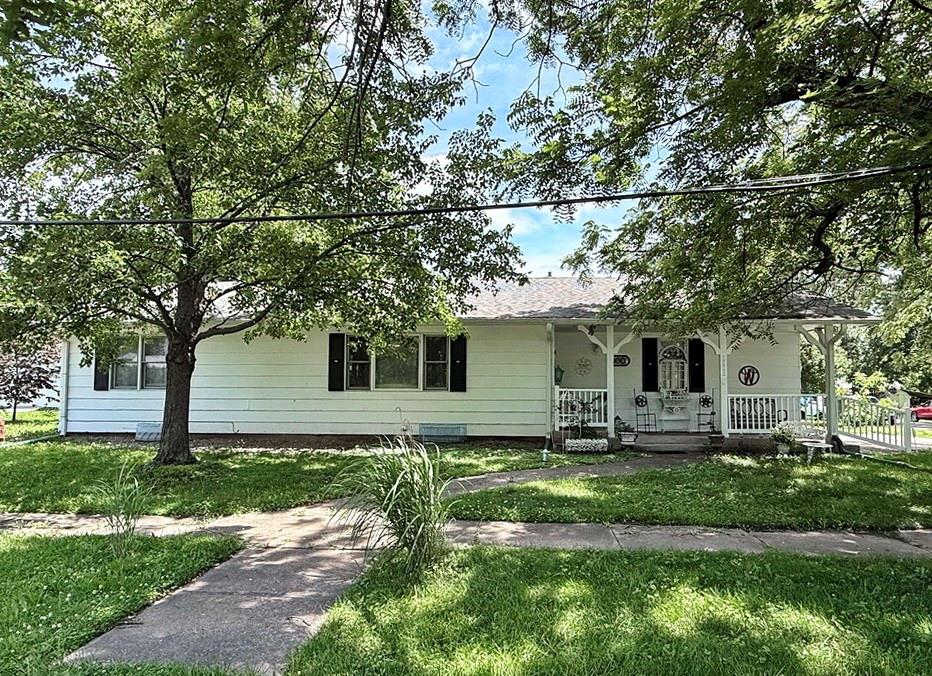 Spacious & Updated Home for Sale in Appleton City, MO. Schedule an appointment TODAY to see this great new listing in Appleton City, MO. This turnkey, 3-bedroom, 2-bathroom, 2,720 square foot ranch style home is one you won't want to miss. This attractive home is beautifully updated, functional, & ready for its next owner! Fresh, modern wall color is complemented by white trim, bright lighting, & luxury vinyl plank flooring throughout the home making it the perfect backdrop for a wide range of decorative styles. The layout is open, flowing nicely from the living room, large dining room, & kitchen. The kitchen features classic white & black painted cabinetry, stainless appliances, & a large island perfect for food prep, storage, & morning coffees with breakfast. A custom coffee bar & built-in pantry give additional style & function to the area. Two bedrooms & one bathroom are on the main level, all featuring large closets & plenty of built-in storage. The main bathroom features a double bowl sink, full-size step-in shower with seat & bars for easy accessibility, & a Smart Home exhaust fan with Alexa capabilities. This home sits over a full, finished basement for double the square footage. The wide, carpeted steps give plenty of space for large furniture to be moved in so you can make this versatile space exactly what you envision it to be. The basement currently features a large living room area, a non-conforming bedroom, a storage room with shelving, laundry area, & a ¾ bathroom. Additionally, the home features a full sized 2-car garage, a water filtration system with softener, & a bonus smart laundry system. Outside, there is an inviting, covered front porch, & a relaxing back deck. A locally built 10x16 garden shed provides additional storage space & a place to park a mower. Call today to schedule your showing on this low-maintenance, move-in ready home in St. Clair County, Missouri.