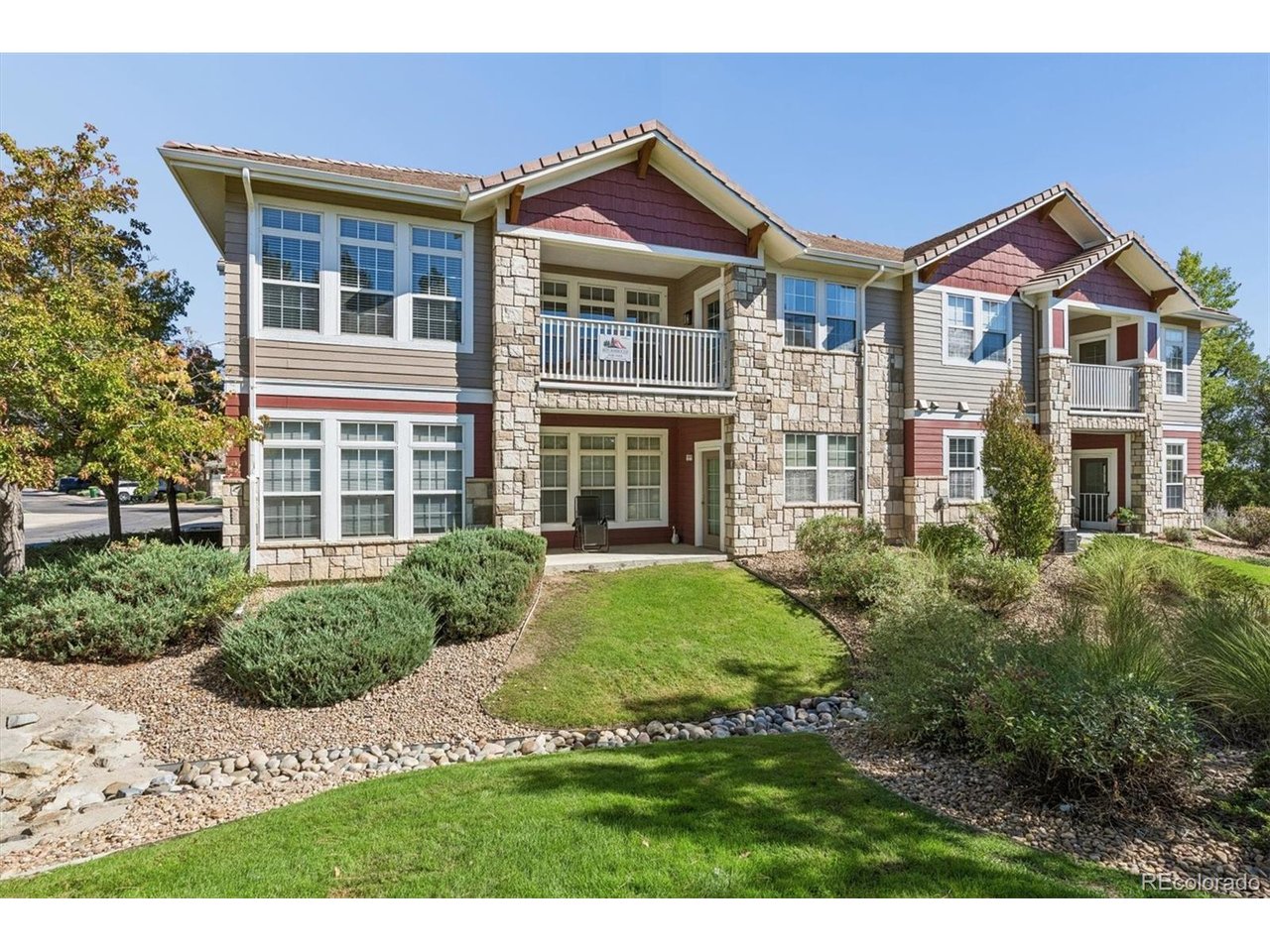 This stunning one of a kind Broadlands condo is better than new!  Enter the first level where you will notice upgraded hardware and flooring and storage closet.  A sunlit in-unit stairway leads to the 2nd floor where you will love the meticulous 3BR, 2 Bath condo with a well equipped kitchen with new appliances.  Laundry room includes W/D and storage space.  Open concept living, dining and kitchen area with large windows and french door leading to a covered balcony/porch.  Upgrades include bathrooms, kitchen, flooring and lighting fixtures.  The location of this unit enjoys afternoon light and spacious covered porch overlooking a peaceful green space .Parking is included as a 2 car garage across the courtyard.Convenient to Boulder, Denver, Westminster, Lafayette and all the Colorado Front Range has to offer. At this price, you'll want to pinch yourself to be sure it's real.