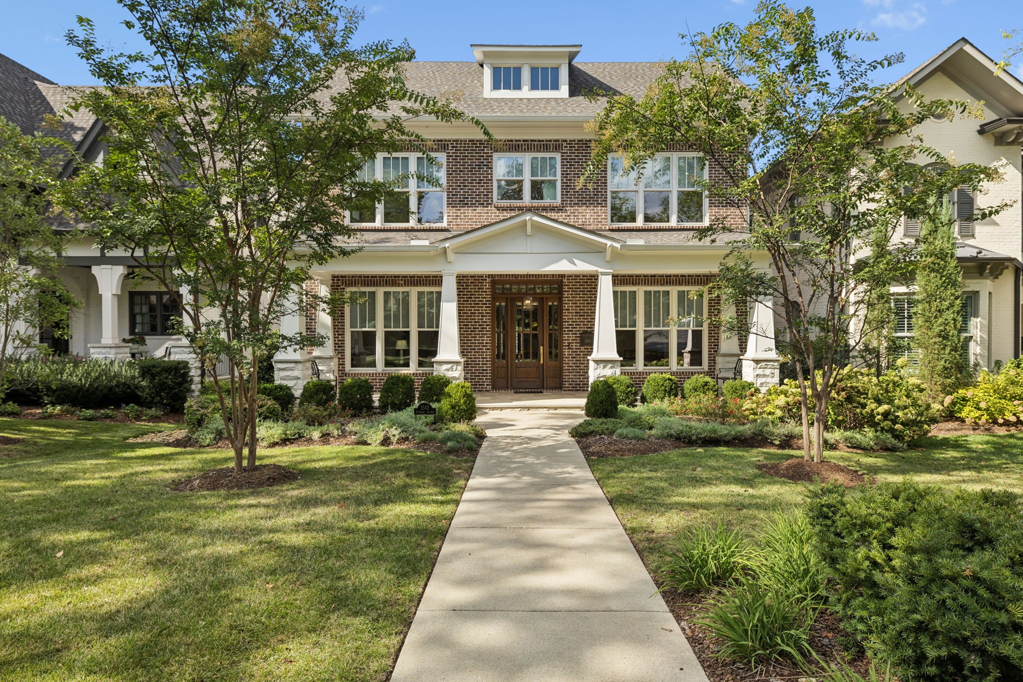 Like new Ford-built 3-level home with an elevator.  Picture this - as you turn onto Richland Avenue in the esteemed Richland/Central area, tree-lined streets and elegant facades greet you. Built in 2020, this home combines modern construction with timeless architectural details. A covered porch invites you to linger and sets the tone for grand yet welcoming interiors. The high ceilings and refined millwork immediately impress. The flow is open and intentional, guiding you naturally from one space to the next. The heart of the home is an open-plan casual living and kitchen zone, perfect for gatherings.  You step out to a large covered back porch, complete with fireplace, where indoor-outdoor living beckons.  The primary suite is on the main level, offering privacy and convenience. Upstairs, generous bedrooms with ensuite baths provide comfort for family or guests. A basement level includes additional guest space and a rec room/fitness room. The elevator access is to all floors - ideal for ease and accessibility. A four-car garage (2x2 tandem) leads directly to the welcoming downstairs hallway. Thoughtful finishes, quality materials, and every detail have been considered. This is more than a house - it's a statement of refined living. 3542 Richland Avenue offers luxury, scale, design, and a location rooted in Nashville's rich architectural and neighborhood legacy.  Come experience it firsthand.