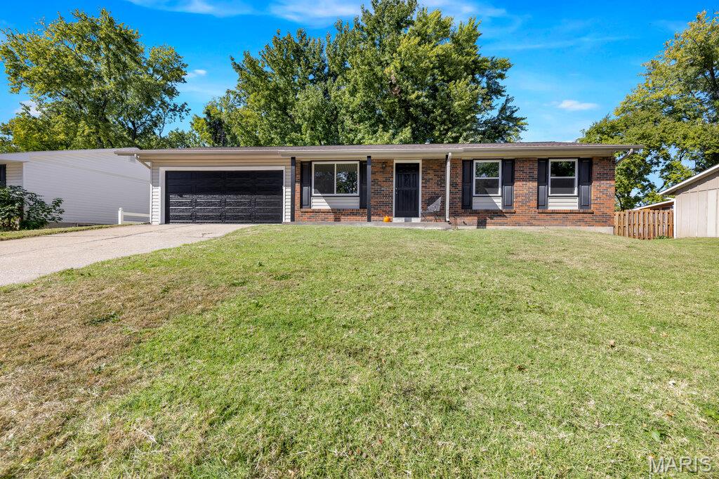 Welcome home to this beautifully refreshed 3-bedroom, 1.5-bath home! Freshly painted throughout with all-new flooring, windows and a new insulated garage door, this home offers a clean, updated feel and is ready for its next owner. The kitchen features brand-new appliances, making it easy to settle in and start enjoying your new space. The partially finished lower level adds even more versatility, with a spacious rec room perfect for entertaining, relaxing, or game nights, plus an additional bonus room ideal for a home office, hobby room, or extra storage. Step outside to enjoy the large, fenced backyard, offering plenty of room for pets, outdoor gatherings, gardening, or simply unwinding. Conveniently located close to shopping and schools, this home combines comfort, functionality, and a great location. With fresh updates and flexible living space, this is one you won't want to miss!