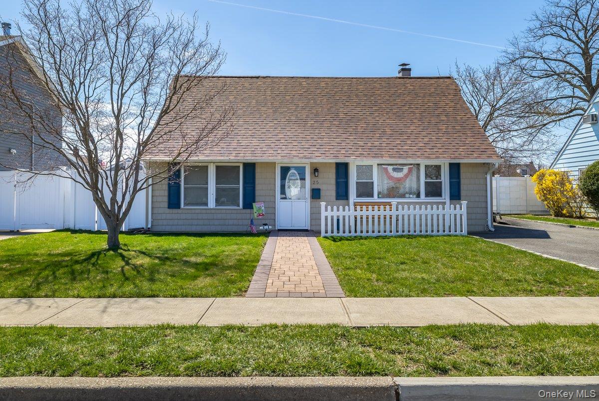 Beautifully maintained 4 bedroom 2 bathroom home nestled in a quiet and desirable neighborhood in Bethpage.  This home features numerous recent updates, including a new roof, updated boiler, new a/c and upgraded plumbing.  Offering peace of mind and move in ready convenience.  New Sliding glass doors off the kitchen and dining area, lead to a brand-new patio, creating a seamless indoor - outdoor flow.  Enjoy the outdoors with a large backyard, ideal for gatherings, gardening or just relaxing.  The extended driveway provides ample parking.This area is close to schools, shopping ,dining and local amenities. This is the perfect opportunity to settle in make this your dream home.