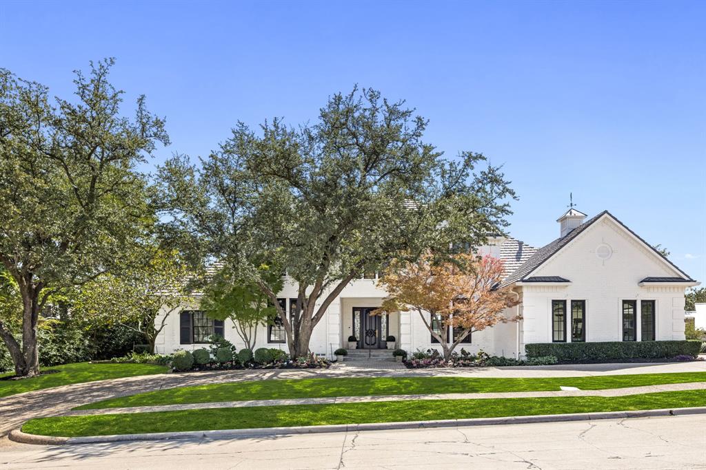 Tucked behind the gates of Fox Glen, one of Las Colinas’ most prestigious guarded and gated communities, this refined estate offers an exceptional blend of timeless elegance, thoughtful renovation, and effortless indoor-outdoor living, on the 16th fairway of the Las Colinas Country Club golf course. Inside, more than 5,100sqft reveal a home designed for both everyday luxury and entertaining, with hardwood floors, designer lighting, and refined finishes throughout. The main living spaces flow seamlessly with expansive windows framing panoramic golf course views. A chef’s kitchen anchors the home with a 12ft island, luxury appliances, and abundant custom cabinetry, all open to dining and living areas ideal for hosting. The private primary suite is a true retreat, complete with hardwood flooring, spa-inspired bath, 2 walk-in closets, and tranquil vistas of the fairway. Beyond the interiors, the backyard delivers resort-style living. A pool and spa with autofill feature, and a beautiful patio awning create a private oasis for outdoor entertaining. A new aluminum fence, frames the lush grounds, while multiple patio areas invite al fresco dining and relaxation. One of the property’s most desirable features is its separate casita with an additional 760sqft of living space with its own bedroom(or office), full bathroom, and living room. It's perfect for guests, multigenerational living, or a private work-from-home retreat. Some enhancements include updated HVAC systems and whole house replaced ductwork, added attic insulation, instant hot water heaters, and a whole-house water filtration system. The garage includes epoxy flooring, EV and Tesla chargers, heavy-duty storage rack with elevator lift, and temperature-controlled storage above. Blending timeless sophistication with modern comfort, this exceptional residence offers a rare opportunity to experience resort-inspired living on the golf course all within minutes of premier shopping, dining, and DFW’s best private clubs.