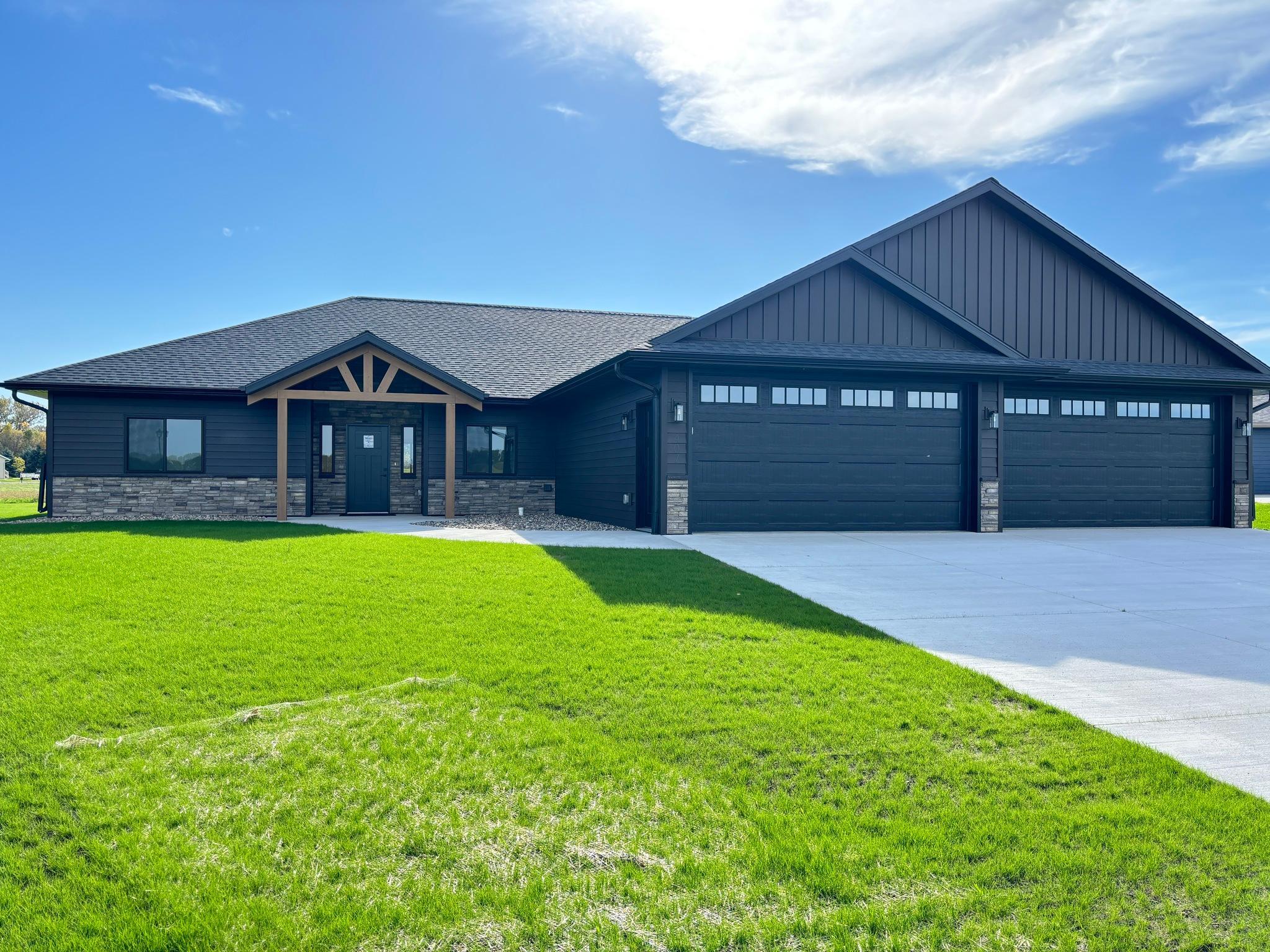 New Construction Patio Home with 4-Car Garage in Sauk Centre  Skip the wait of building and move right into this newly completed patio home at 407 Halfaday Drive. Offering 2,245 square feet of single-level living, this thoughtfully designed home features 3 bedrooms, 21/2 bathrooms, an office/flex room, and a 4-car attached garage.  The open-concept kitchen, dining area, and great room offer a spacious, light-filled setting for everyday living and entertaining and are complemented by a vaulted ceiling. The kitchen features a large island with seating, pantry, custom-built rift red oak cabinets, granite countertops, and stainless steel appliances.  The primary suite features a walk-in closet outfitted with built-in drawers and shelving for organized storage, plus an ensuite bathroom with a double vanity and a large, zero-entry tiled shower. Two additional bedrooms share a full bathroom, while a separate half bath adds convenience for guests. A laundry/mudroom connects the home to the 1,026-square-foot garage, providing ample space for vehicles, storage, and hobbies. Storage trusses offer additional overhead storage, a valuable bonus in a patio home.  Enjoy the rear patio, cedar timber-framed covered front entry, and completed landscaping. Luxury vinyl plank flooring and a fireplace accented with black shiplap complete this inviting, move-in-ready home.