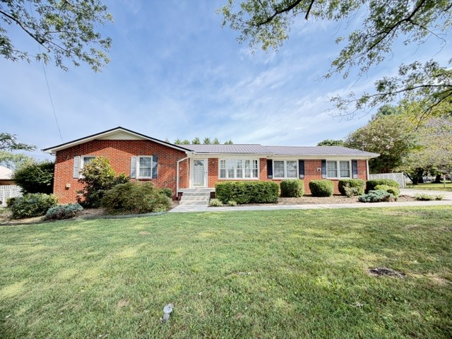 Welcome home to this beautifully updated 3-bedroom, 2-bath home offering the perfect combination of comfort, style, and space! Step inside to find a warm and inviting interior featuring hardwood and LVT flooring, fresh paint, and an updated kitchen that's ready for everything from everyday meals to entertaining. One of the standout features is the spacious heated and cooled sunroom, surrounded by windows galore that fill the space with natural light-perfect for relaxing, entertaining, or enjoying year-around. You'll also appreciate the abundance of storage, giving you plenty of room to keep everything organized. Outside the large, fenced backyard and spacious deck offers plenty of space to gather, run and play. The detached garage provides even more storage and versatility. With thoughtful updates, generous living spaces, and a backyard ready to enjoy, this home is move-in ready and waiting for it's next chapter.