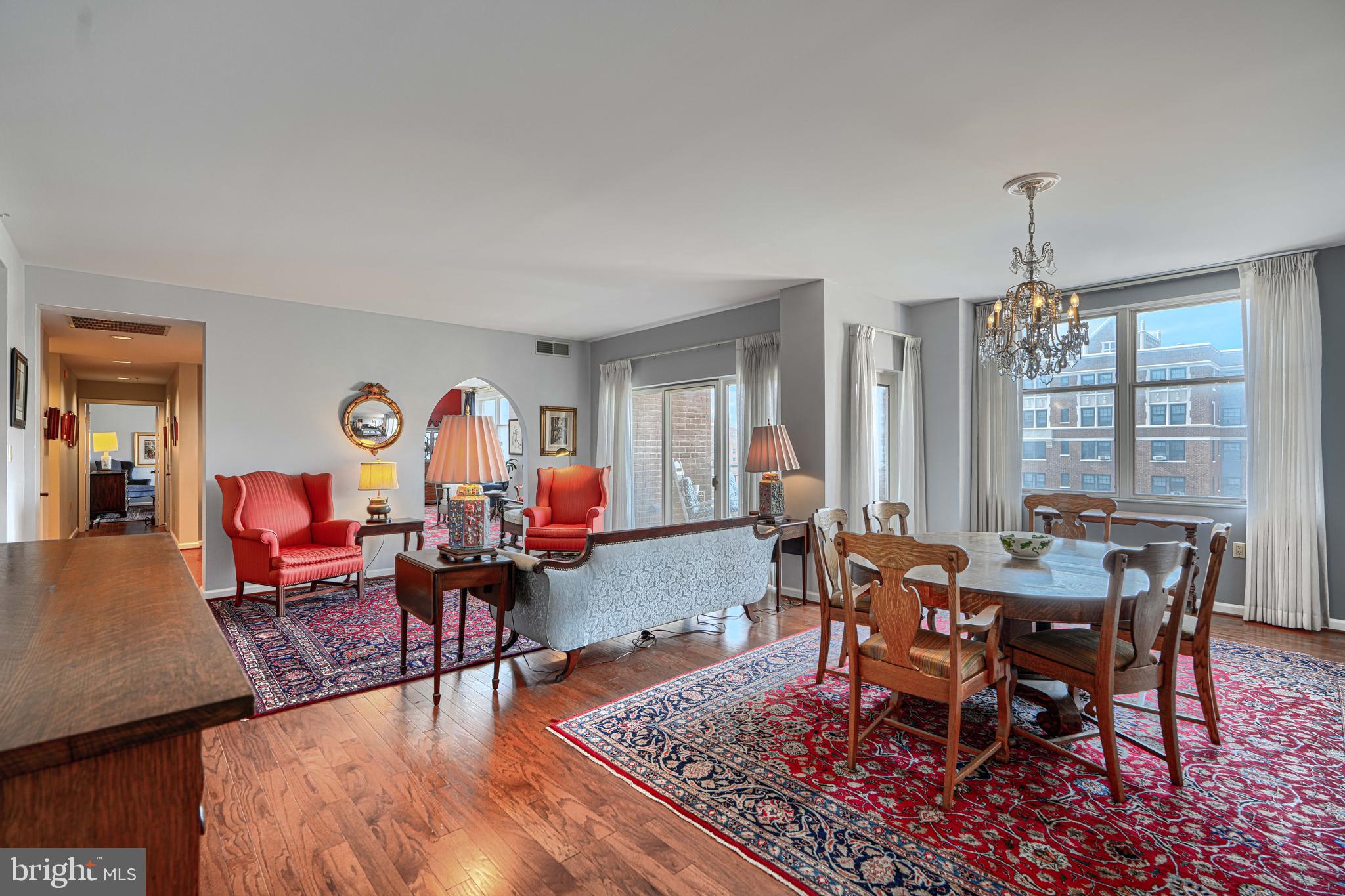 Welcome to this exceptional condominium residence in the prestigious Residences at the Colonnade. Offering more than 2,200 square feet of elegant living space and two private balconies, this expansive home combines comfort, sophistication, and convenience in one of Baltimore's most desirable addresses. Beautiful hardwood flooring, installed throughout the unit in 2021/2022, creates a seamless and refined aesthetic. The thoughtfully designed floor plan features an ensuite primary bedroom, two full baths, and a powder room. The primary bedroom suite features a private balcony and the second bedroom space (13' x 24') is currently used as a den. The Residences at the Colonnade offer one of Baltimore’s most distinctive luxury condominium lifestyles, combining the privacy of homeownership with the convenience of full-service living. Two deeded parking spaces, 24-hour reception desk and doorman, exercise/fitness center, and assigned storage space (s) just so many amenities to enjoy living in the Colonnade. Located in the prestigious Guilford/Tuscany-Canterbury area directly across from Johns Hopkins University, the building is known for its spacious residences, exceptional service, and unbeatable location. Walk to the numerous restaurants, cafes & shops, the Baltimore Museum of Art and the glorious Sherwood Gardens! A must see!