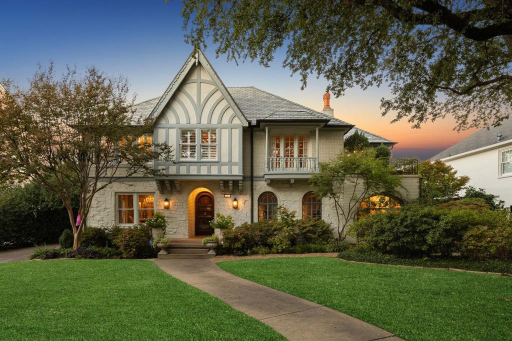 Set on one of Highland Park’s most beloved streets, this 1928 Tudor blends historic character with modern luxury. Behind its classic brick façade and beneath a canopy of stately trees, the home offers a perfect balance of old-world charm and contemporary updates.
The beautifully remodeled interior features four spacious bedrooms, a light-filled sunroom, and gracious living areas highlighted by original architectural details. The large, open family room offers an inviting fireplace and double doors that open to the pool and patio—perfect for effortless indoor-outdoor living and entertaining. The brightly updated kitchen is outfiitted with marble sink, countertops and top of the line stainless appliances. Upstairs, the primary suite is oversized with a sitting area that opens to a balcony nestled among the treetops. 
Outdoors, enjoy resort-style living with a sparkling pool, lush mature landscaping, and multiple entertaining spaces. A large guesthouse provides ideal accommodations for visitors or flexible use as a home office or studio. Completing the property are a rare three-car garage and thoughtfully designed grounds that ensure both privacy and elegance.
This is a rare opportunity to own a piece of Highland Park history—where timeless design meets modern comfort.