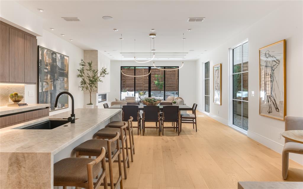 Welcome to the epitome of modern elegance and serene living at 3608 N Fitzhugh Avenue, Dallas. This newly constructed two-story duplex is a harmonious blend of Japanese and Scandinavian design principles, offering a minimalist yet functional lifestyle.This stunning residence features 3 spacious bedrooms and 3.1 baths, each crafted to provide a tranquil retreat. The primary suite is a true sanctuary, complete with a spa-like bathroom, creating a serene atmosphere for relaxation.The heart of this home is its state-of-the-art kitchen, equipped with premium Wolf and Subzero appliances, ideal for both everyday cooking and gourmet entertaining.The home features an elevator-ready closet, adding convenience and accessibility to this sophisticated space, while a flexible loft area offers endless possibilities whether for a home office, reading lounge, or calming yoga space.Moments from the vibrant Katy Trail, the timeless charm of Highland Park, and the energy of Dallas, this residence provides effortless access to premier dining, shopping, and entertainment. Discover a new level of thoughtful design and serene comfort at 3608 N Fitzhugh Avenue where modern style meets purposeful living.