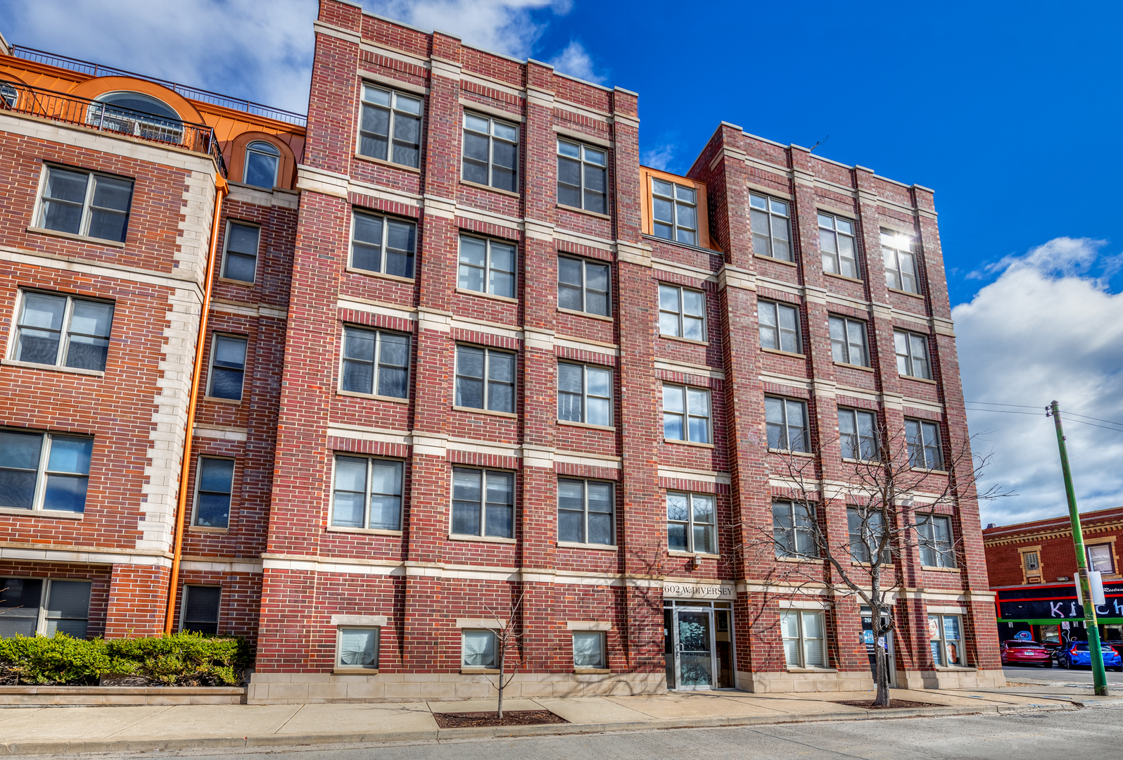 **BEST & FINAL OFFERS DUE BY TUESDAY 7/22 @ 6pm**Enormous 1900 square foot Corner End Unit! Tons of beautiful natural light flowing into this stunning high floor South and East exposure corner unit!  As you enter into the large foyer area, your eye will be drawn to the many bright windows surrounding the entire living room area!  High ceilings, oak floors, fireplace, and more than enough room for even the largest of dining tables, make it the perfect entertaining unit, too!  Beautiful kitchen with cherry cabinets, stainless steel appliances, and granite countertops! Plus a large pantry!  All 3 bedrooms are large with great closet space and beautiful natural light in all! Master bedroom is huge, with great walk-in closet, balcony, and huge master bath with whirlpool and separate shower. Second full bath with large slate tile shower! Full size side by side washer/dryer in unit, and one exterior parking spot included in price. Concrete and steel construction building with Elevator and also wired for CAT 5! Fabulous Avondale location right on the cusp of Logan Square! Two blocks to Logan Blvd, Starbucks, Target, Restaurants, Shopping, 90/94 and more! WOW!