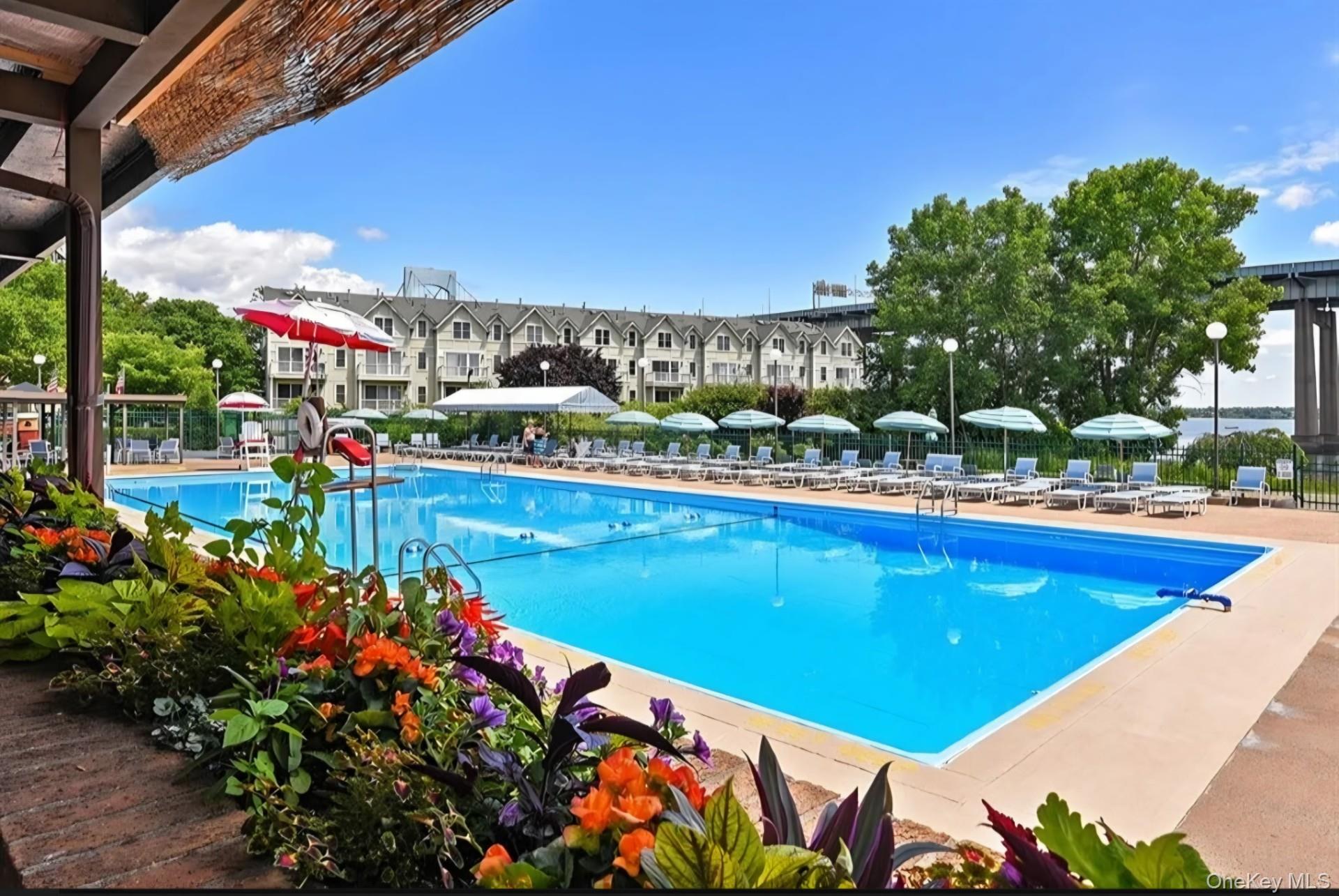 BIG PRICE REDUCTION !!!! WON'T LAST!!!!!!!  SELLER IS WILLING TO PAY $10,0000 TRANSFER FEE!!!!  Beautifully designed and renovated 2 bedroom apartment in Le Havre.  Fully updated with gorgeous wood floors throughout. Beautiful flat ceiling with high hats.  Custom electric fireplace/TV wall in living room.  Great living/entertaining space and large terrace. Kitchen with stainless steel appliances and beautiful wood cabinets and tiled backsplash. The full bathroom is beautifully updated. Great amenities include fitness center, pool, security, tennis courts and cafe/clubhouse. Monthly assessment $146.25. Easy access to NYC Express bus and local bus to Flushing/#7 train.