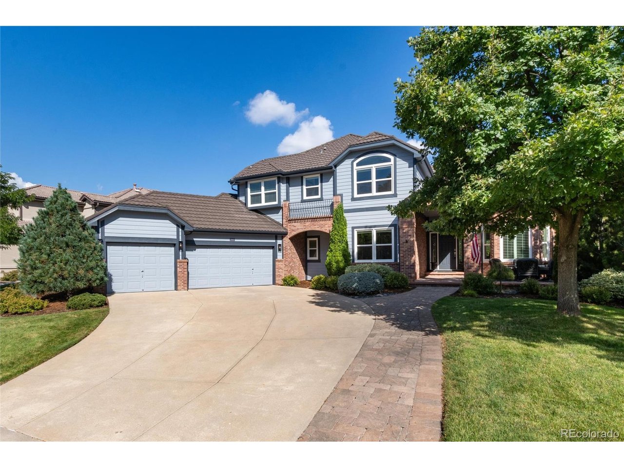 With its premier south-facing location and panoramic golf course views in the prestigious Reserve of the West Woods Ranch Community, this pristine custom Aspen Leaf two-story backing to the fourth Fairway will jump to the top of your list. It's over 3095 square feet plus a 1713 square foot basement, of which 771 square feet are finished; vaulted ceilings, picture windows, and exquisitely updated bathrooms throughout are just a few of its superior features.  The addition of the fully furnished 11x18 ft outdoor covered porch with its vaulted tongue-and-groove cedar ceiling makes it an almost year-round entertainment area overlooking the sought-after " The Cottonwood at West Woods Golf Course".  From here, it is just a short walk to the greenbelt and the Ralston Creek Trail Water Feature not to mention the Colorado Taphouse.