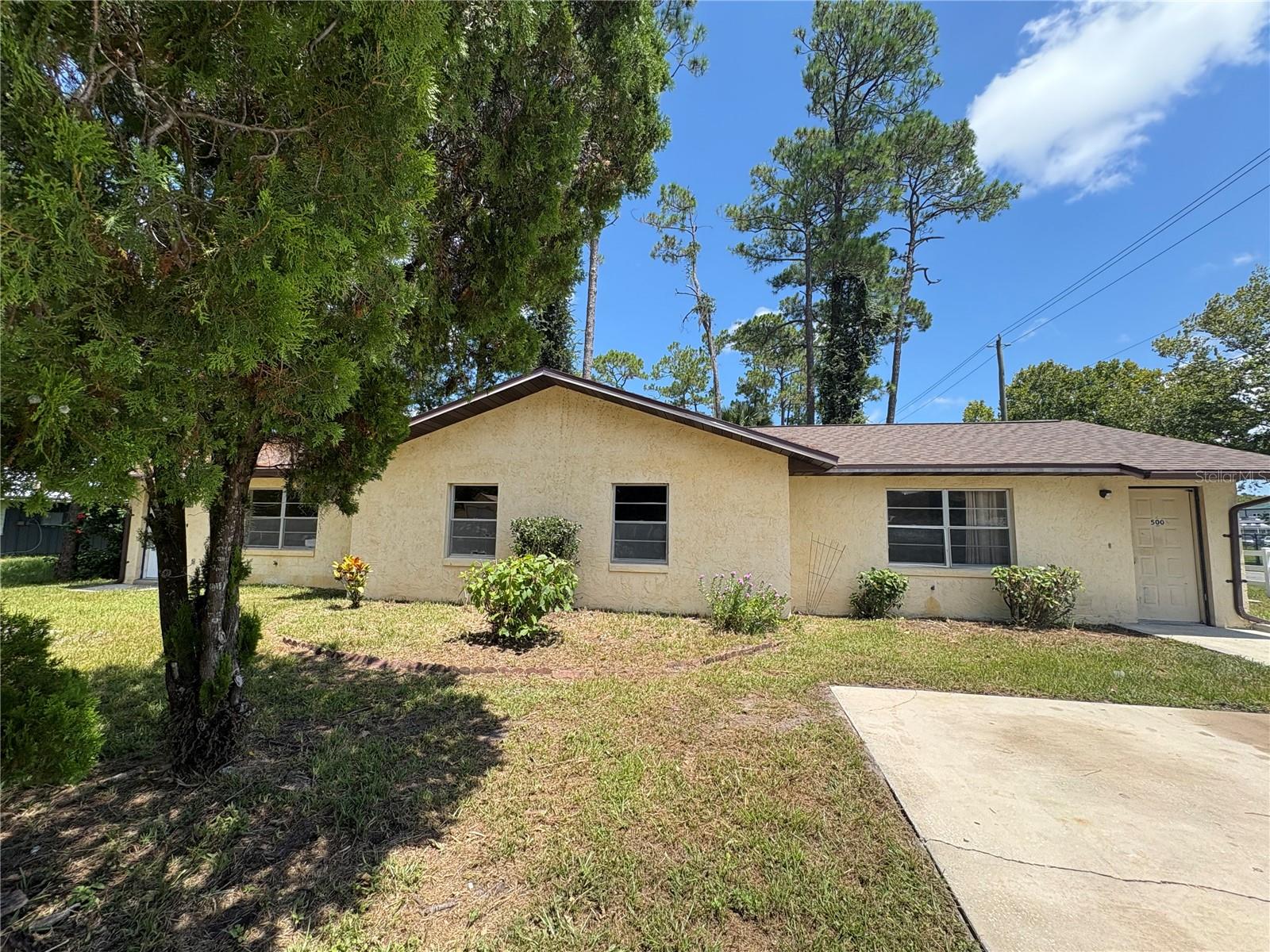 Looking for Rental Income?  This duplex is situated on a corner lot located right behind the Elemenatary school, which is ideal to help produce that income.  One side was completed renovated and a brand new roof on the entire home.  Laundry room with the hot water heater inside, located on the side of the units.  This was used for family members, so no rental history.  Both sides are vacant.