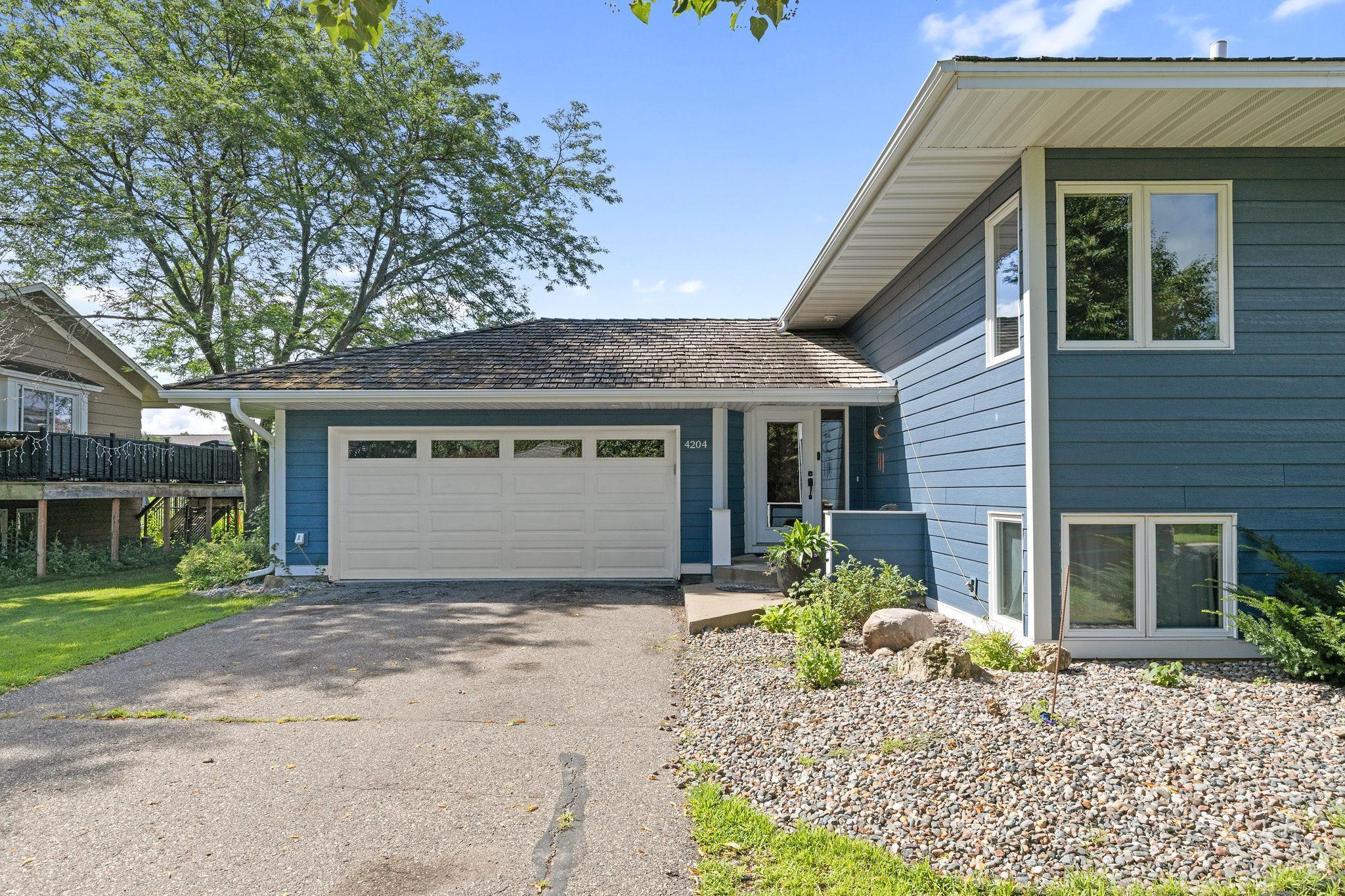 Welcome to this beautiful home in Rosemount! Featuring 6 bedrooms, 2 bathrooms, and a 2-car garage, this home offers an open-concept layout that’s perfect for everyday living and entertaining. Enjoy summer days in the stunning below-ground pool, all within the privacy of a fully fenced backyard.
Don’t miss your chance to own this ideal blend of space, comfort, and outdoor fun. Conveniently located near parks, schools, restaurants, and more. This home has it all!