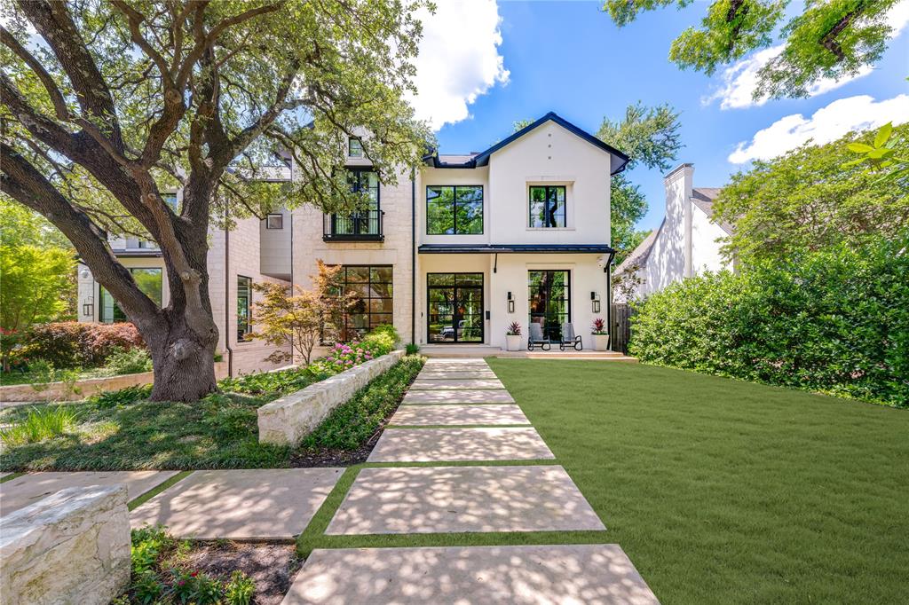 Re-introduced at a new price, with fresh revisions, nestled along the serene waters of Turtle Creek, this extraordinary custom estate offers over 9,517 SF of refined luxury and cutting-edge technology. Designed by acclaimed architect Robbie Fusch, this four-level residence is a statement of contemporary elegance, featuring Scandinavian white oak flooring, Porcelanosa tile, and exquisite ceiling details throughout. Step inside to discover seven bedrooms, nine full baths, and a powder room, alongside three expansive living areas warmed by four fireplaces and all connected by a four-floor elevator. The heart of the home boasts a chef’s kitchen with custom cabinetry, two dishwashers, a built-in espresso machine, all seamlessly connected to the indoor-outdoor loggia backing up to Turtle Creek—a spectacular space with a fireplace, sliding Panda doors, dual infrared heaters, and a built-in powered screen, allowing for climate-controlled comfort. Innovative design meets advanced technology with Savant home automation, 31 built-in automatic window shades, Lutron RR2 lighting, a state-of-the-art Tesla solar roof with Powerwalls, and a generator providing energy efficiency and backup capabilities like no other. Entertain effortlessly with 90+ built-in speakers, 100+ Cat 6 data ports, and custom AV throughout. The climate-controlled 6-car basement garage is a true standout, featuring sealed impermeable floors and LED lighting. Additional highlights include a private gym with a full bath, a custom imported Canadian-built climate-controlled wine closet with a capacity of over 700 bottles, and strategically placed infrastructure to enhance natural light and open spaces. Designed for both luxury and efficiency, this home is a masterclass in modern living, offering an unparalleled combination of sophistication, innovation, and architectural excellence in one of Dallas’ most sought-after locations. Schedule a private tour today to experience the future of luxury at 6715 Golf Drive!