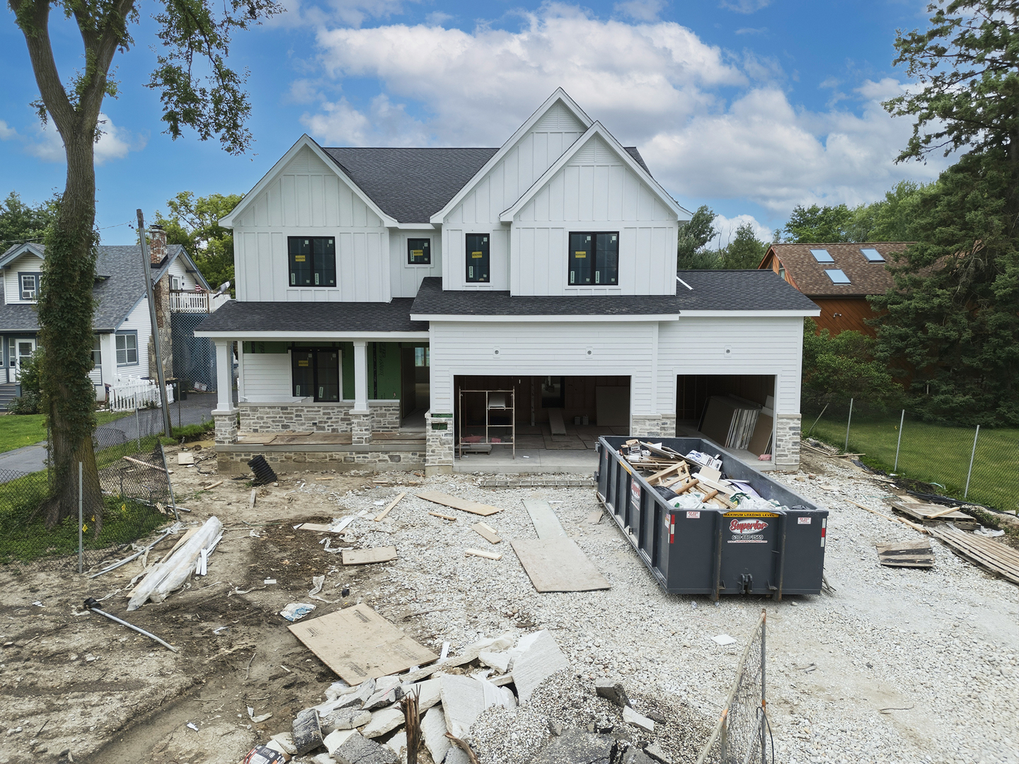 Envision your future home in the esteemed Hinsdale Central High School District, where a magnificent new construction is rising. This planned residence will feature 5 bedrooms and 4.1 baths, designed with modern living in mind. The family room will include a cozy gas fireplace and will seamlessly flow into the dining room and a gourmet kitchen. The kitchen will be equipped with custom cabinetry, soft-close doors and drawers, Quartz countertops with undermount sinks, a premium Subzero/Wolf appliance package, and a spacious walk-in pantry. The first floor will offer flexibility with an office space or 5th bedroom, complete with an ensuite bathroom. The design also includes a convenient mudroom with built-in lockers, cubbies, a sink, and cabinetry. Four second floor bedrooms including an expansive primary suite and second floor laundry. A 3-car attached garage with an EV charging port and a concrete driveway completes the plan, all set on a generous 75 x 400-foot lot located on a quiet street surrounded by luxury homes. Quality construction will include Stone and Hardie Board siding, a waterproofing membrane on the foundation, and architectural lifetime shingles. A covered front porch will provide a welcoming entrance, while Energy Star insulated Pella windows ensure efficiency. Two Aprilaire humidifiers, and zoned heating and cooling systems will provide comfort. A 75-gallon water heater will support all your needs, and with 10-foot ceilings in the basement and first floor, and 9-foot ceilings on the second floor, the home will offer an expansive feel. White oak hardwood flooring will grace the entire first floor, staircase, and second-floor hallway, highlighted by a custom white oak staircase with elegant black iron spindles. Anticipate enjoying this future home, with an estimated completion of September 2026, conveniently located near shopping, restaurants and major highways.