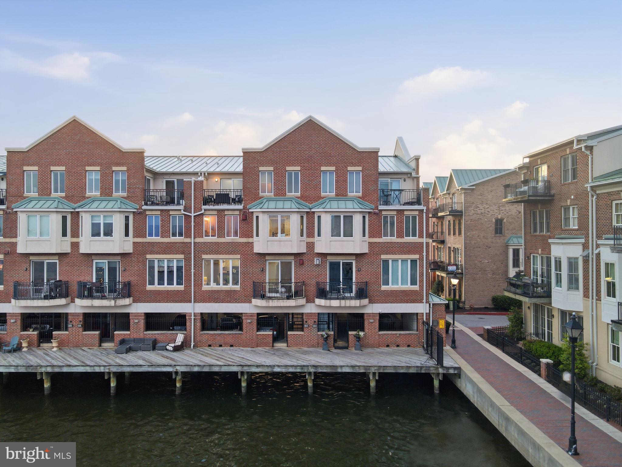 This home is still able to be shown with all offers being a back-up contract.Perfectly positioned along Baltimore’s coveted waterfront, this exceptional three-level residence in the heart of Canton offers an elevated blend of luxury, privacy, and modern coastal living. Featuring two expansive primary suites, each thoughtfully designed with spa-inspired baths and generous closet space, this sophisticated waterfront condominium delivers the feel of a private townhome with the convenience of upscale condo living.Floor-to-ceiling windows invite natural light throughout the home while showcasing breathtaking water views from multiple levels. The open-concept main living area is ideal for both refined entertaining and relaxed everyday living, seamlessly connecting the designer kitchen, elegant dining space, and inviting waterfront lounge area. Premium finishes, rich textures, and carefully curated details create a warm yet contemporary atmosphere throughout.Retreat to the upper levels where both luxurious primary suites provide tranquil sanctuaries overlooking the water, offering the perfect balance of comfort and sophistication. The private rooftop deck creates the ultimate setting for entertaining, relaxing under the stars, or taking in sweeping waterfront and city skyline views.Located just moments from Canton’s vibrant dining, boutique shopping, marinas, and waterfront promenades, this rare offering combines urban convenience with resort-inspired living in one of Baltimore’s most sought-after neighborhoods. A truly exceptional opportunity to experience luxury waterfront living at its finest.