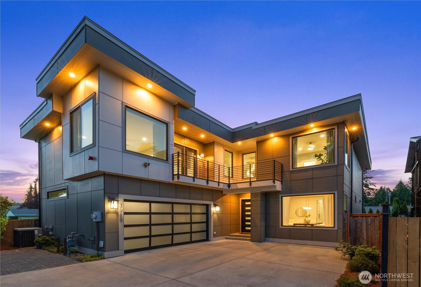NEW IMPROVED PRICE! BEST VALUE in Kennydale. Privately situated at the end of a secluded driveway, this exceptional NW Contemporary home blends modern luxury w/ timeless Craftsman-inspired design in one of Renton’s most desirable neighborhoods. A bright & airy entry sets the tone, opening to refined living spaces that seamlessly connect for both intimate gatherings & grand entertaining. Anchored at the heart of the home, the kitchen serves as a true culinary centerpiece, showcasing premium appliances, a statement island that invites connection, a generous butler’s pantry, & wet bar. The main-floor bedroom w/adjacent ¾ bath provides flexibility for multigenerational living, guest suite, or a home office. Upstairs, the luxurious primary suite captures sweeping Lake Washington views & features a private covered deck, spa-inspired soaking tub, & generous walk-in closet, creating a true retreat. A second junior primary suite w/attached bath, large bonus room, & two additional spacious bedrooms offer versatility. Additional highlights: two laundry rooms, mudroom, EV charger ready, A/C, central vacuum, low-maintenance yard, abundant parking, NO HOA. Covered outdoor living on the main level extends the home year-round, while upper decks showcase serene views. Located just minutes from 405, LW parks, Kennydale Beach, Coulon Park, The Landing, Bellevue/Seattle, Boeing, Sea-Tac & the East Trail for walking & biking. A rare opportunity to own a spacious view home in a premier location!