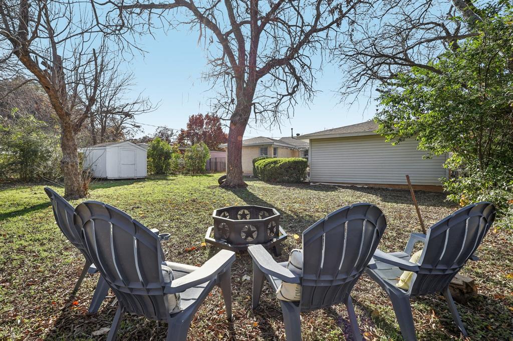 Nestled on a spacious corner lot in, this charming updated home is ready for new owners! Open concept from living and dining areas, great for family fun!  Enjoy the warmth of hardwood floors in the living and dining areas, complemented by durable LVP flooring in the kitchen. Kitchen features granite counter tops and ample cabinetry, perfect of the cook in the family! A versatile flex space can serve as a 4th bedroom, a second living area or a study! The private patio extends your living space outdoors, leading to an oversized yard complete with a fire pit and shed, perfect for cozy evenings under the stars.  This backyard is designed for relaxation or entertaining!  Listed BELOW appraised value, this home is a must-see. Recent updates, including a new roof and HVAC! There is an ASSUMABLE LOAN available on this great home!