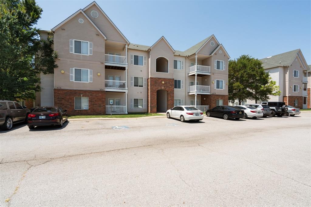 Blocks from University of Oklahoma Campus — perfect for students or investors! Each spacious bedroom features a private bath and walk-in closet. Open Concept Living Area, wood Tile floors throughout, freshly painted and cleaned; Stainless Steel Microwave, Dishwasher, Kitchen Stove, and Refrigerator, and a washer and dryer - All appliances are newer and well taken care of. Ceiling Fans with Remotes and ambient light fixtures in the Kitchen and common areas. Private Covered Patio w/ Private Fencing. The Edge offers resort-style amenities to include a pool, hot tub, fitness center, Basketball and Volleyball courts and more. Schedule your showing today! Professional Photography will be added Monday evening with aerial photos! Call today to see it before it sells!