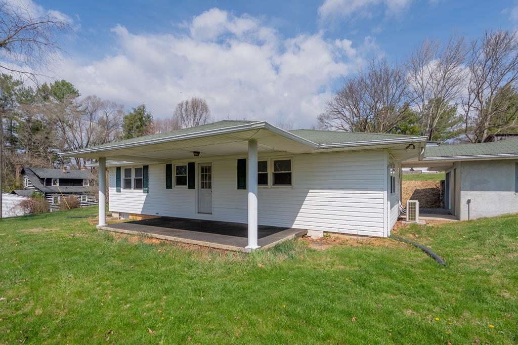 This charming 2 BR 1 BA home in Bland, VA sits on approximately half an acre and has been beautifully remodeled throughout. Inside, you'll find new laminate flooring, fresh drywall, and insulated tilt windows that bring in natural light while improving energy efficiency. The home features a brand new mini split system for heating and cooling, along with a completely updated kitchen designed for modern convenience. A main level laundry room adds everyday practicality. With approx. 1,225 finished square feet, there's also a partial unfinished basement offering additional storage. Outside, the home boasts low maintenance vinyl siding, a freshly graveled driveway, and a large covered front porch with peaceful mountain views, perfect for relaxing. A detached 1 car garage provides space for parking, storage, or a workshop. The roof was replaced in 2013. Conveniently located within walking distance to local amenities and just minutes from I-77, this property offers both comfort and accessibility.