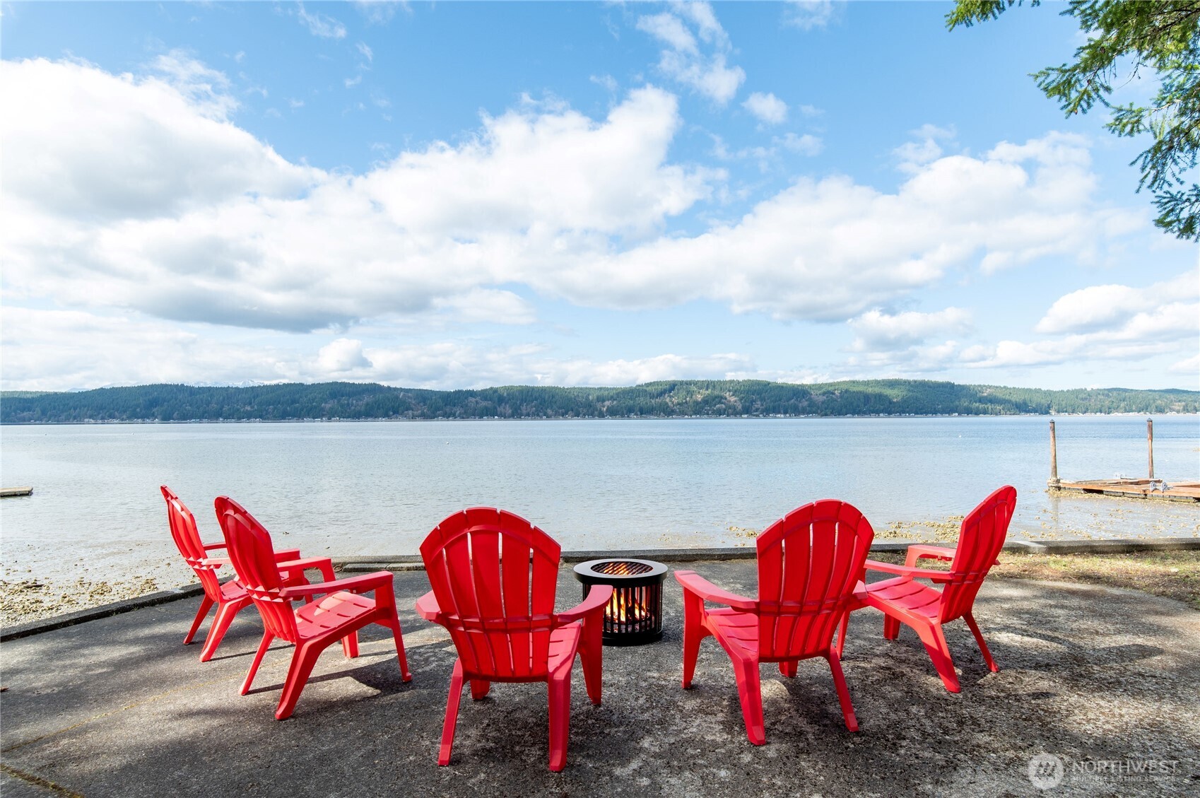 Welcome to your Hood Canal retreat—where dreams become lifelong memories. Set on nearly 1.5 acres with 100 feet of waterfront, this rare offering includes two parcels, allowing for future expansion or the creation of a custom estate. Enjoy sweeping Olympic Mountain views, golden late-afternoon sun, and the peaceful rhythm of waterfront living. A covered front porch invites you to slow down and take in the natural beauty that surrounds you. Spend your days harvesting oysters and clams from your own shoreline, kayaking or boating along the canal, or simply relaxing as the tide rolls in. Expansive grounds provide space to gather, unwind, and entertain, with room for campfires, outdoor dining, and creating unforgettable moments with friends. Ample parking is a true rarity on the coveted South Shore, offering added convenience for hosting and everyday living. Ideally located near Alderbrook Resort and at the gateway to the Olympic Mountains, this is a timeless escape, full-time residence, or investment opportunity in the heart of the Pacific Northwest.