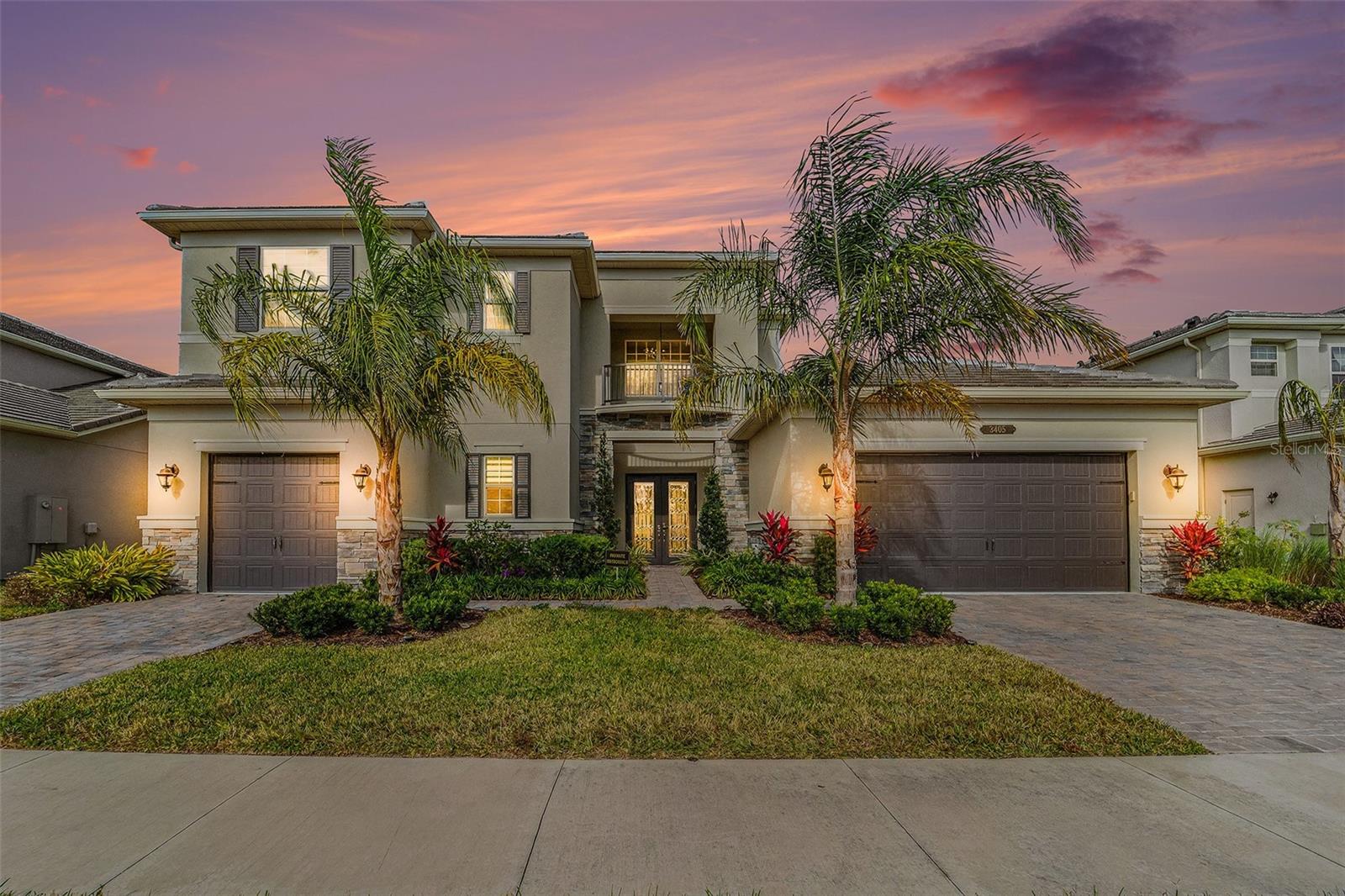 Welcome to your private paradise! Contact us for more details. Imagine living in 4,501 Sqft of luxury in one of the most desirable developments in central Florida! Winding Ridge in Wesley Chapel. This Modern/Contemporary Amethyst floor plan by GL Homes is loaded with many upgrades and is move-in ready. It offers a versatile open floorplan with 4 bedrooms, 5 full bathrooms a half bath, den/office, a 3-car garage, and a family room/playroom. High-end finishes, fully upgraded! Once you enter the home, you will notice your light and bright Wide-open floor plan with high ceilings and a majestic staircase. The first floor features an office, wet bar, spacious great room, powder room, formal dining room, fully upgraded gourmet kitchen, a guest suite, and owner's suite. The owner's suite features His and her walk-in closets, a walk-in shower, a double quartz vanity, and a soaking tub. The gourmet kitchen includes quartz countertops, stainless appliances, a gas range, 42" wood cabinets, and an oversized center island. The staircase takes you to the second floor, which features 2 bedrooms, 2 bathrooms, and the theater/playroom. A brick-paved driveway & tile roof complete this immaculate home, conveniently located close to the community clubhouse. Residents of Winding Ridge experience excellent amenities with a magnificent clubhouse and more than a 5-acre recreation area that features top-tier amenities for fun, fitness, and relaxation. Best of all, from resort-style pools to fitness to racquet sports, it's all yours to enjoy. When you live at Winding Ridge in Wesley Chapel, you'll enjoy a one-of-a-kind lifestyle with top-tier resort-style amenities, acres of pristine preserves, sparkling lakes, and a stunning multimillion-dollar entry to welcome you home every day. HOA fee includes lawn mowing, landscape maintenance, fertilization, mulching & exterior pest control. Winding Ridge is centrally located on SR-56 near Wiregrass Mall, Tampa Premium Outlets, USF, Moffitt Cancer Hospital, Advent Health Hospitals, Pasco State College, Center Ice, I-75 & I-275. Minutes from I-275 & I-75 + easy access to I-4. 30m Drive to Downtown Tampa & Tampa Int'l Airport. Don't wait to build. THIS HOME WON'T LAST! Schedule your showing today!