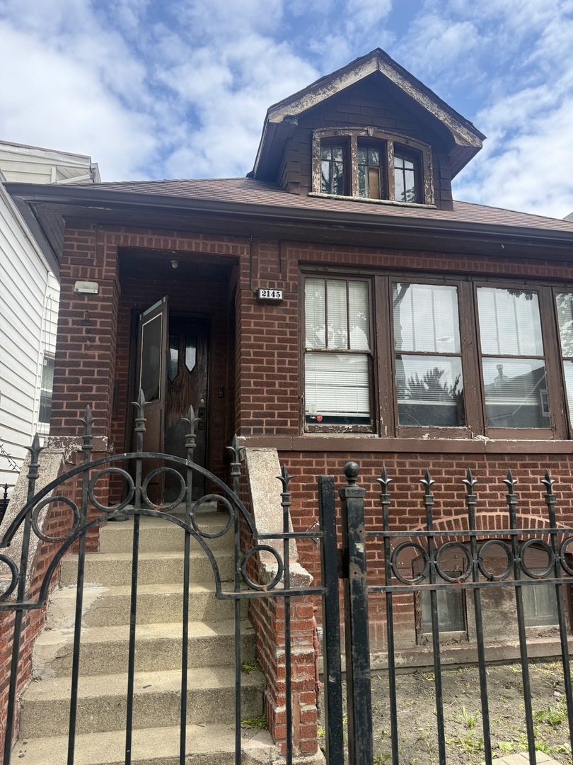 INVESTOR SPECIAL IN HOT HERMOSA NEIGHBORHOOD! WELCOME TO 2145 N KARLOV, A CLASSIC CHICAGO BRICK BUNGALOW WITH ENDLESS POTENTIAL. THIS SPACIOUS 4-BEDROOM, 1.5-BATH HOME IS AN EXCELLENT OPPORTUNITY FOR INVESTORS, REHABBERS, OR SAVVY BUYERS LOOKING TO BUILD EQUITY. THIS LOVELY HOME FEATURES A TRADITIONAL LAYOUT, FULL BASEMENT, AND SOLID BRICK CONSTRUCTION-READY FOR YOUR UPDATES AND VISION. THE MAIN LEVEL BOASTS HARDWOOD FLOORS, AN OPEN-CONCEPT LIVING/DINING AREA, THREE BEDROOMS, A FULL BATH, AND AN EAT-IN KITCHEN. UPSTAIRS, YOU'LL FIND A  GENEROUSLY SIZED BEDROOM AND AMPLE ATTIC SPACE. THE FULL UNFINISHED BASEMENT INCLUDES A SECOND BATHROOM AND OFFERS ENDLESS POSSIBILITIES FOR EXPANSION. THE BACKYARD HAS AMPLE SPACE TO BUILD AN OVERSIZED GARAGE OR CONCRETE PAD, NEW CONCRETE WALKWAY ON SOUTH SIDE OF THR HOME. IDEALLY LOCATED JUST BLOCKS FROM THE 606 TRAIL, METRA STATION, PARKS, RESTAURANTS, AND ALL THAT LOGAN SQUARE HAS TO OFFER. THIS PROPERTY IS BEING SOLD AS-IS-DON'T MISS THIS FANTASTIC VALUE IN A RAPIDLY APPRECIATING NEIGHBORHOOD! **NEW WATER HEATER (2015), NEW ROOF (2013).