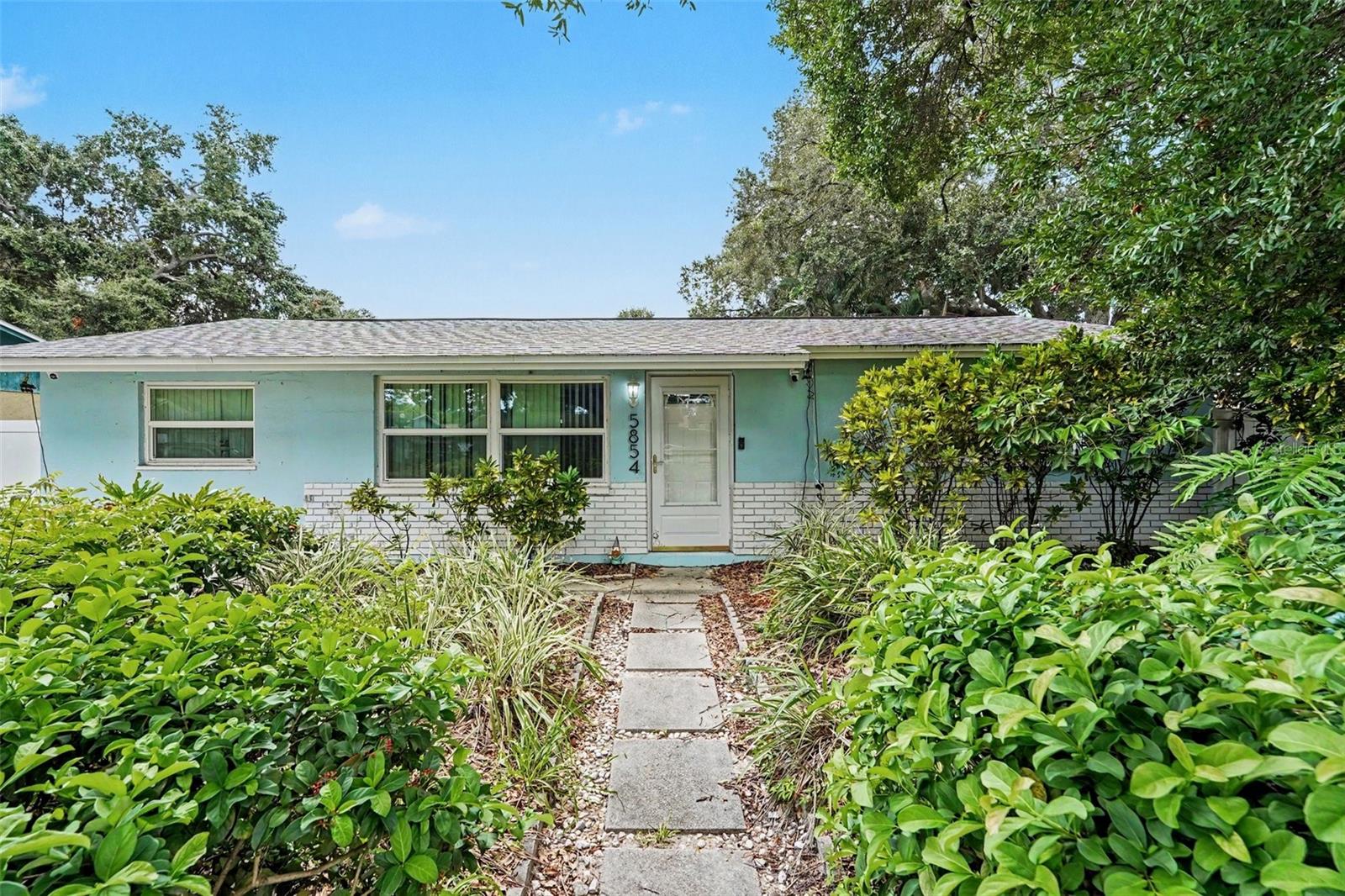 NO HOA | PRIVATE POOL | FLEX BONUS ROOM | NON-FLOOD ZONE X! Welcome to this updated 2BR/1BA pool home boasting 1,056 sq ft of light-filled living space plus a versatile garage conversion—perfect as a 3rd bedroom, home office, gym, or flex space! Step outside to your private oasis featuring a sparkling screened-in swimming pool and fully fenced backyard. Expanded driveway offers ample parking for boats, RVs, or trailers. UNBEATABLE LOCATION & DISTANCES: ~10-15 mins to top-rated Madiera Beach, Sand Key & St. Pete Beach; ~12 mins to vibrant Downtown St. Pete, St. Pete Pier & Tropicana Field; ~10 mins to PIE Airport & ~20 mins to Tampa International Airport (TPA)! Top Pinellas County schools nearby including Plato Academy Charter (~1.5 mi), Skyview Elementary, and Pinellas Park High. High and dry non-flood zone! Minutes to US-19, I-275, Park Blvd, shopping, dining, and parks. Turnkey, move-in ready, and ideal as a primary residence, starter home, or investment!