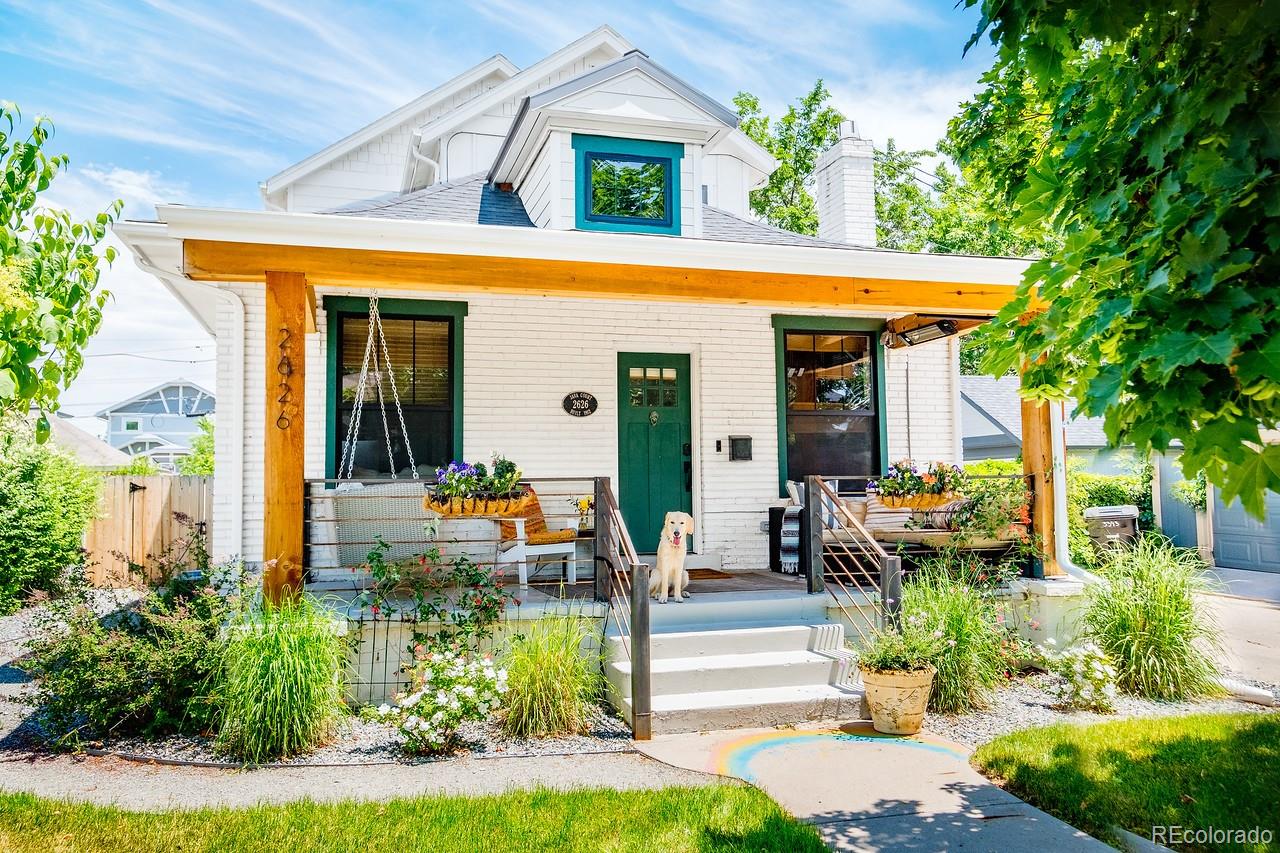 Perfectly situated in the coveted Sloan’s Lake/West Highlands neighborhood, this stunning 1912 pop-top beautifully blends historic character with modern luxury. Taken entirely down to the studs and reimagined in 2018, the home preserves its classic curb appeal and authentic front porch, welcoming you into a sophisticated contemporary retreat. Inside, the main level features a bright, expansive open-concept floor plan accented by wide-plank oak floors and bathed in natural light. The layout flows from a cozy reading area with a fireplace into a spacious living room and dining area. The spectacular chef’s kitchen boasts a premium Bertazzoni stove, custom hand-carved wooden hood, elevated designer lighting, a 10-foot granite island, and a dedicated bar area with wine cooler. A versatile main-floor bedroom makes the perfect private home office. Upstairs, the second level hosts a magnificent primary suite complete with a walk-in closet, attached bath, and a private Juliet balcony with views of downtown Denver. Two additional bright bedrooms feature ceiling fans and share a full bath. The outdoor features a large, low-maintenance Trex deck and a pet-friendly private turf yard, leading to a detached 2-car garage. Mechanically, the home offers dual furnaces, dual A/C units, a tankless on-demand water heater, and abundant storage in the basement. Enjoy unbeatable Denver living while relaxing on your charming front porch or venture out on a short, breezy walk to both Sloan's Lake and the vibrant restaurants along 32nd Avenue! Downtown Denver, Mile High Stadium, and Ball Arena are a short 2-mile walk or drive, making this location perfect for all of Denver's popular destinations, yet nearby Brown Elementary is ranked one of the best in Denver!