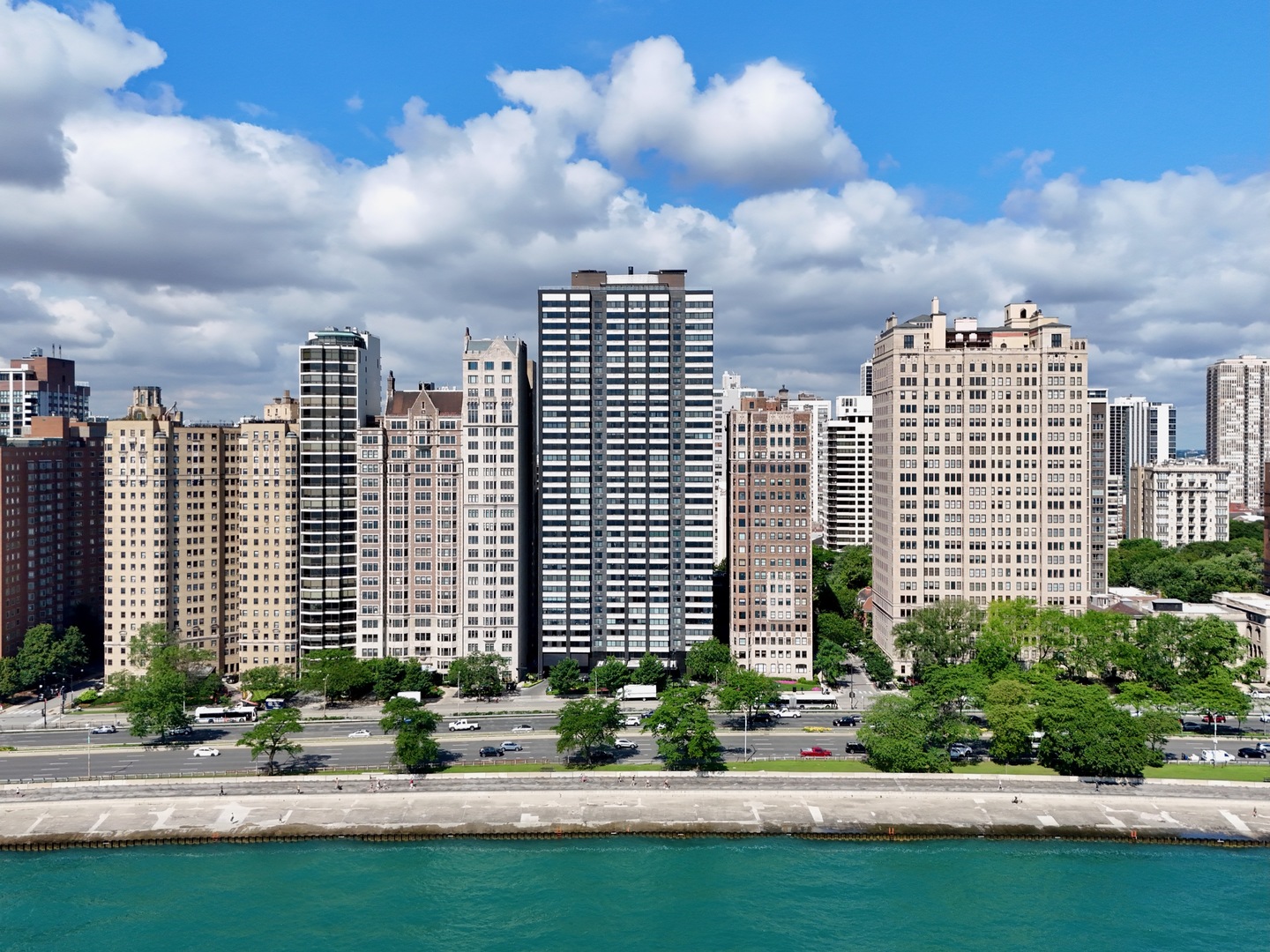 A fabulous, sprawling 4-bedroom, 3.5 bath 2,500 sq ft residence with sensational views from the 20th floor of this very well-run, full amenity condominium building. The 44 ft living/dining room, which includes a wet bar, is perfect for entertaining while enjoying panoramic, unobstructed views of Lake Michigan, Navy Pier, and the shoreline of Oak Street and North Avenue beaches. The remodeled kitchen is outfitted with Bosch appliances and an induction cooktop, offering both style and functionality for everyday living or gourmet cooking. Two bathrooms have been tastefully renovated, and the home also includes in-unit laundry and generous storage throughout. The master suite and second bedroom (currently used an office) both have wonderful westerly rooftop views of the historic Gold Coast neighborhood. 1440 N Lake Shore Drive has very recently undergone extensive renovations, and features 24-hour door staff, a fitness center, attached valet garage parking for 2+ cars ($287 per month per car), visitors parking, assigned large storage lockers, bicycle storage and an on-site management office. The building's 35th floor provides a newly renovated residents' lounge and a huge roof deck with some of the best views in Chicago. The monthly assessment includes cable/internet and radiant heat. Superbly located moments from the Magnificent Mile and all the very best Chicago has to offer. Pet friendly for two pets (up to 50 lbs).