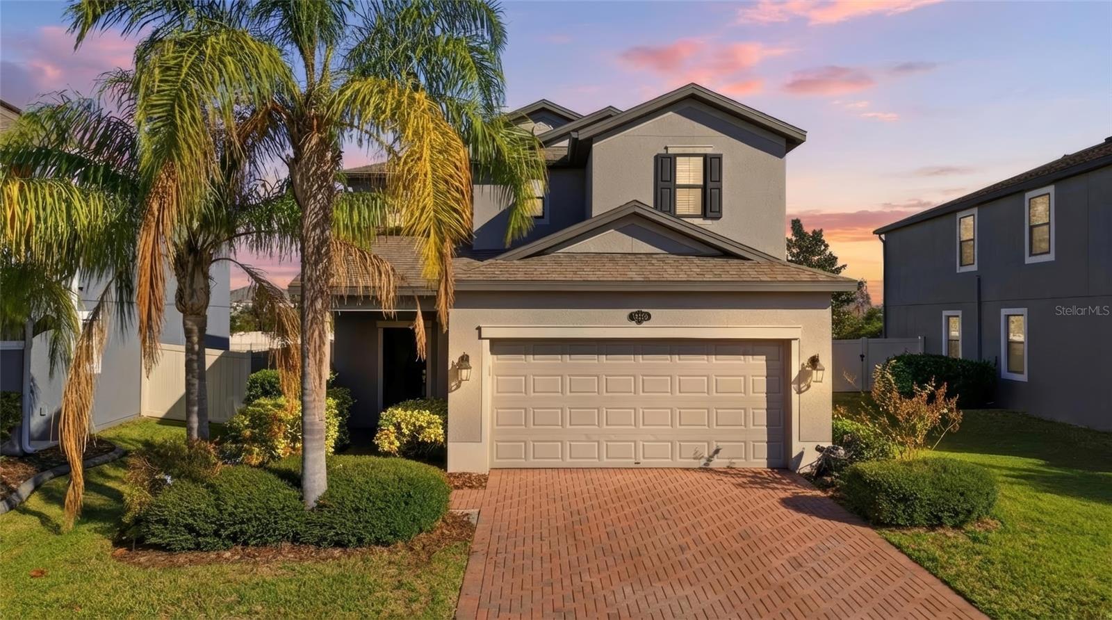 One or more photo(s) has been virtually staged. Welcome to 19656 Long Lake Ranch Blvd, a beautifully maintained two-story home in the sought-after Long Lake Ranch community in Lutz. This spacious 3-bedroom, 2.5-bath home offers over 2,100 square feet of comfortable living space and features a flexible layout perfect for everyday living and entertaining. The kitchen is a standout with granite countertops, stainless steel appliances, a large island with bar seating, and a walk-in pantry, all open to the living and dining areas. Upstairs, you'll find a generous primary suite with tray ceilings, a large walk-in closet, and an en-suite bathroom with dual vanities, a soaking tub, and a separate shower. Two additional bedrooms and a full bath complete the second floor, along with a laundry room for added convenience. Enjoy peaceful views of the pond right from your fully fenced backyard, or relax on the screened-in patio. The home also features a spacious office on the first floor, a two-car garage, and neutral finishes throughout. Living in Long Lake Ranch means access to top-tier amenities including a resort-style pool, tennis and basketball courts, dog park, playgrounds, walking trails, and a scenic lake with a fishing dock. Zoned for top-rated schools and conveniently located near shopping, dining, and major highways, this home offers the perfect blend of comfort and community living. Schedule your private showing today!