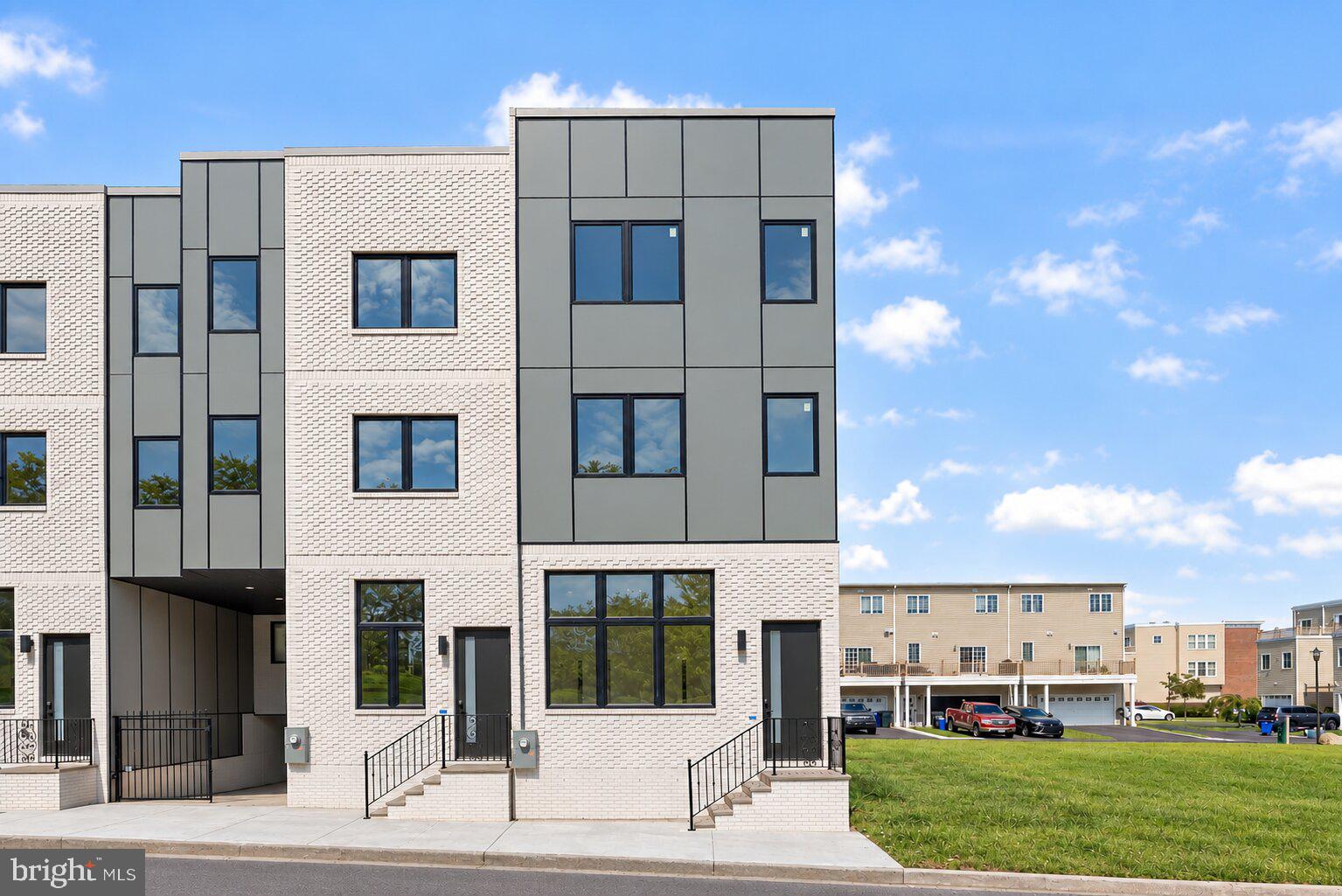 **QUICK DELIVERY HOMES AVAILABLE!!!** Welcome to 2423 Hartranft Street, a brand-new luxury residence in the heart of Packer Park, located just steps from the sold-out Sienna Place community. Offering over 3,000 sq. ft. of thoughtfully designed living space and over 1,000 sq. ft. of outdoor space, this 3-bedroom, 3.5-bath home combines modern architecture, elevated finishes, and exceptional indoor-outdoor living.The home features an open-concept main level with spacious living and dining areas and a beautifully appointed gourmet kitchen with high-end appliances, designer cabinetry, and contemporary finishes. The main level opens to an expansive 30-foot backyard deck, creating an ideal setting for outdoor dining, entertaining, or relaxing.The luxurious primary suite offers a private balcony, walk-in closet, and spa-inspired bathroom with premium fixtures. The third floor provides an additional 12-foot rear deck, while the rooftop deck offers panoramic skyline views and a private space to entertain or unwind.Additional features include a private garage and additional gate and covered parking, energy-efficient systems, and a convenient location near Center City, major highways, the Philadelphia sports complex, shopping, and dining. With no HOA fees and a full 10-year tax abatement, 2423 Hartranft Street offers an exceptional opportunity to enjoy the benefits of brand-new construction in one of South Philadelphia’s most desirable neighborhoods. Reach out today to schedule your private tour. Taxes and square footage are the responsibility of the buyer to verify independently.