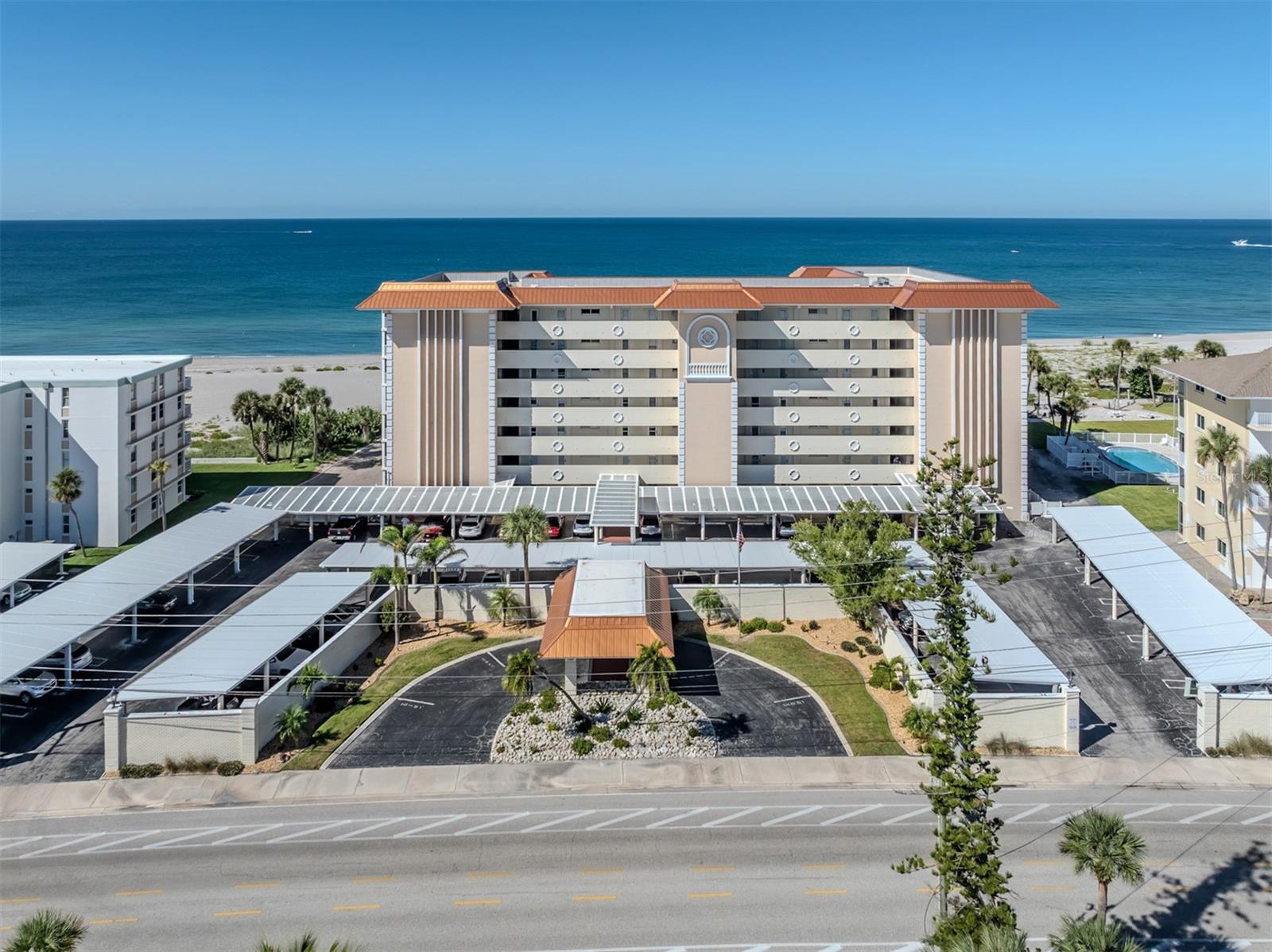 Welcome to The Towers on Venice Beach, where modern coastal style, exceptional amenities and an unbeatable island location come together. This beautifully renovated fourth-floor condominium offers two bedrooms, two baths and 1,205 square feet of thoughtfully designed open-living space, along with desirable southern exposure and sweeping views of Venice Beach and the turquoise waters of the Gulf. The bright, open interior features updated flooring, fresh paint, plantation shutters and impact-rated windows and doors. The renovated kitchen is beautifully appointed with quart countertops, a white glass tile backsplash and an island-inspired layout ideal for entertaining. The spacious primary suite offers Gulf views, an en-suite bath and walk-in closets. One of the residence’s most impressive features is the expansive 31-foot lanai, complete with hurricane-impact sliding doors and turtle-friendly, glare-reducing lighting. It is the perfect place to enjoy morning coffee, coastal breezes, spectacular sunsets and unobstructed beach and Gulf views. Additional improvements include a new HVAC system and water heater (2024). An in-unit washer-and-dryer hookup is in place, while a community laundry room is located a short distance away on the same floor. Residents enjoy direct beach access, a large beachfront pool with ample seating, outdoor showers and restrooms, a community grilling area and dedicated bicycle and kayak storage. The unit includes assigned covered parking, generous guest parking and a private 5-by-4-foot storage cage located on the same floor, ideal for storing beach equipment and other personal items. The Towers is one of the few pet-friendly beachfront communities on Venice Island, allowing owners up to two dogs or cats. The monthly condominium fee includes internet, cable, water, sewer, trash service, exterior maintenance and pest control. A well-managed association keeps the community consistently maintained and cared for. Boating and fishing enthusiasts will appreciate being directly across from Venice Yacht Club, Freedom Boat Club and Pelican Bay, where boat slips may be available for rent. The Crow’s Nest restaurant, North Jetty and newly refurbished Venice Beach are all nearby, with dolphin and manatee sightings adding to the coastal experience. Historic downtown Venice is just minutes away, offering boutique shopping, restaurants, theaters, parks, golf, tennis and pickleball courts, farmers markets, craft fairs, downtown concerts and the popular Venice Beach drum circle. Whether you are seeking a full-time residence, seasonal retreat, vacation getaway or potential rental investment, this exceptional Gulf-view condominium provides an outstanding opportunity to enjoy the best of beachfront living on Venice Island. Furnishings negotiable.