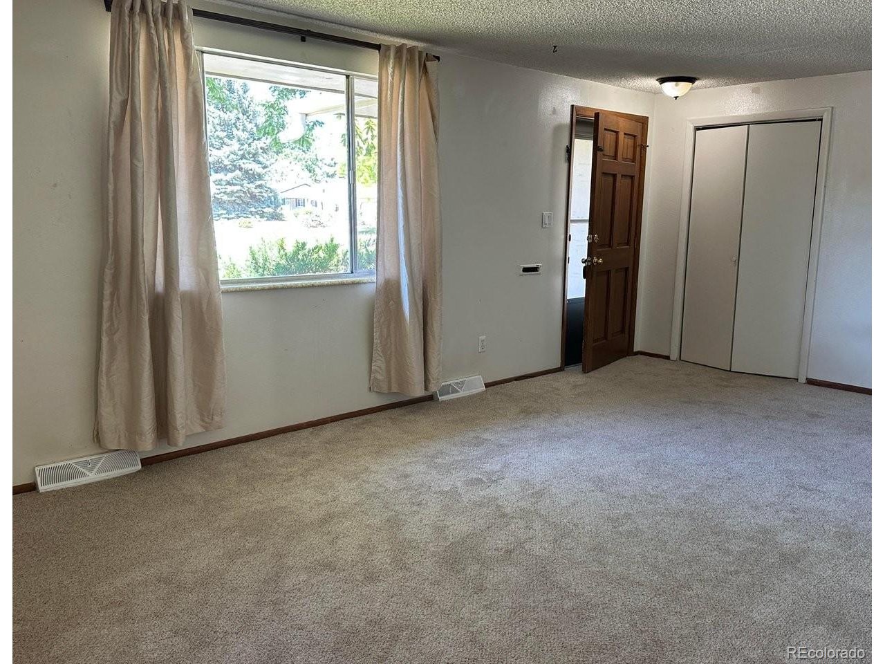 Welcome home to this ranch-style home. Ideally located just north of Loveland High School and North Lake Park, with Benson Park nearby, this home offers convenient access to recreation, schools, and all that Loveland has to offer. Don't miss this opportunity to make it your own!Featuring 3 bedrooms, 1 full bath, and an oversized 1-car garage, and shed, this property also offers additional off-street parking perfect for a second vehicle, boat, camper, or trailer.The kitchen comes complete with appliances -refrigerator, electric range/oven, and dishwasher. Luxury vinyl plank flooring enhances the kitchen and dining areas, while newer carpet adds comfort throughout the rest of the home. Convenient main-floor laundry makes everyday living easy.The dining room opens to a bright enclosed patio with large windows, creating a wonderful space to relax while enjoying views of the backyard. An additional flex area in the kitchen/dining space offers endless possibilities for a bistro table, hobby corner, workspace, or extra storage.The primary bedroom features direct access to the shared full bath. Outside, you'll find a large fenced backyard with plenty of room for pets, play, gardening, or entertaining.