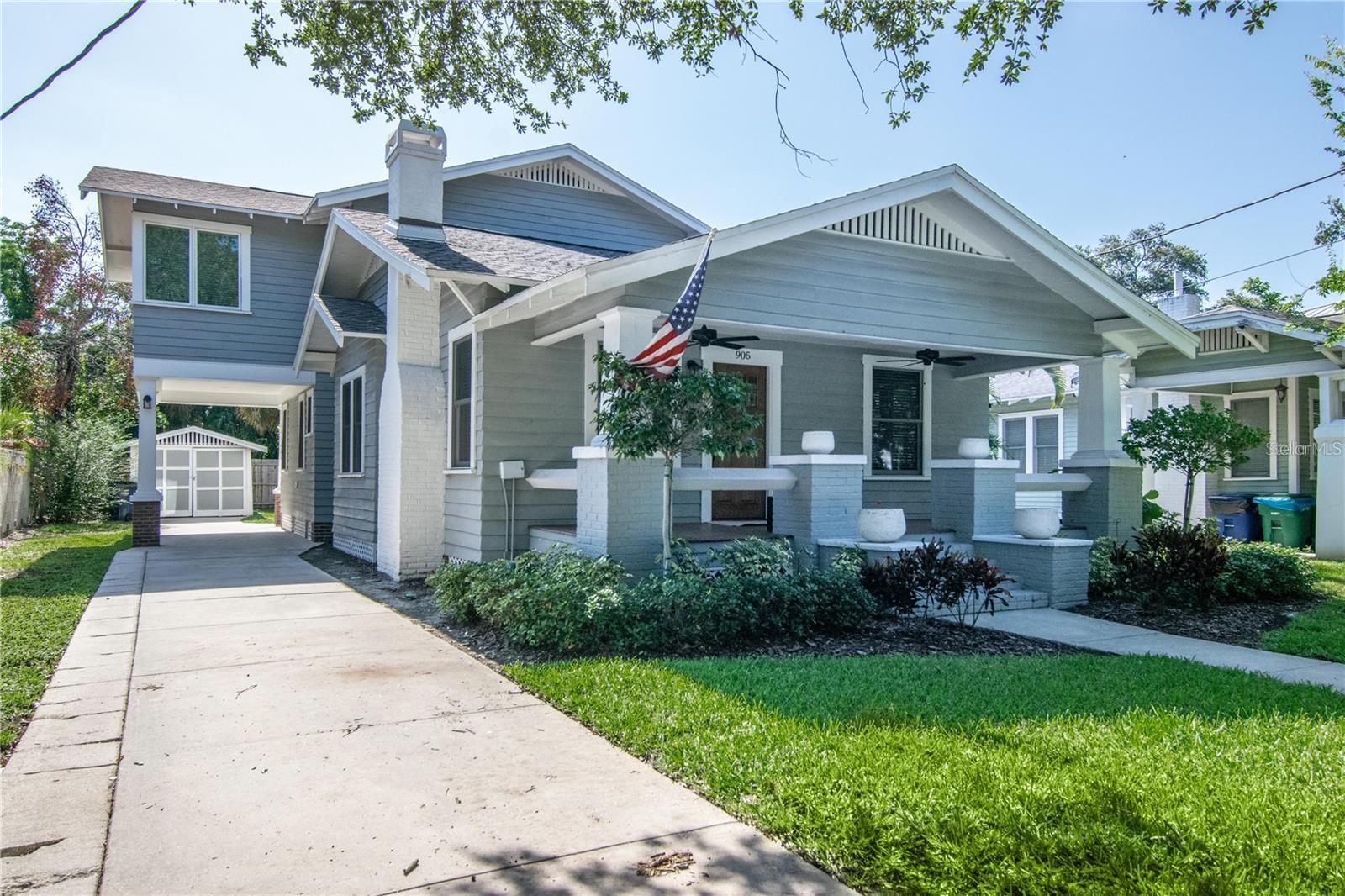Beautiful home in the heart of Hyde Park! This 3 bedroom 3 and a half bath, bungalow was renovated down to the studs in 2016 and has been beautifully brought back to life with no expense spared. AC 2026. The large front porch greets all who enter. Natural light abounds through double paned windows and gives flow through the open floor plan. The downstairs encompasses a sitting area accented by the fireplace, formal dining area with built-ins, private bedroom and bathroom wing, kitchen, family room, wet bar and half bath. An entertainment dream, the kitchen boasts Viking appliances, gas range, quartz countertops and provides additional cabinet space with the addition of the island. The wet bar is centrally located and includes a wine fridge. The back of the main floor is home to an in-kitchen eating area and sizable family room. Both downstairs bathrooms have been beautifully upgraded with marble flooring, vanities and fixtures. Upstairs, the owner’s suite spans 14x16. Owner’s bath has been upgraded with marble throughout, dual sink vanities, private water closet and a separate makeup table. Customized closet systems adorn the walk-in closet. The third bedroom, full bath, laundry closet and loft that can be used as a home office or gym, complete the upstairs. The covered back porch and expansive backyard allow for continued entertainment space with room for a pool. The long driveway gives ample space for parking, includes a car port, and leads to an enclosed workshop/shed to house all outdoor utility needs. This driveway is so long that you could park 6 cars no problem.  Convenient to downtown Tampa, Tampa International Airport and walking distance to Hyde Park Village, Bayshore Boulevard and SOHO.
