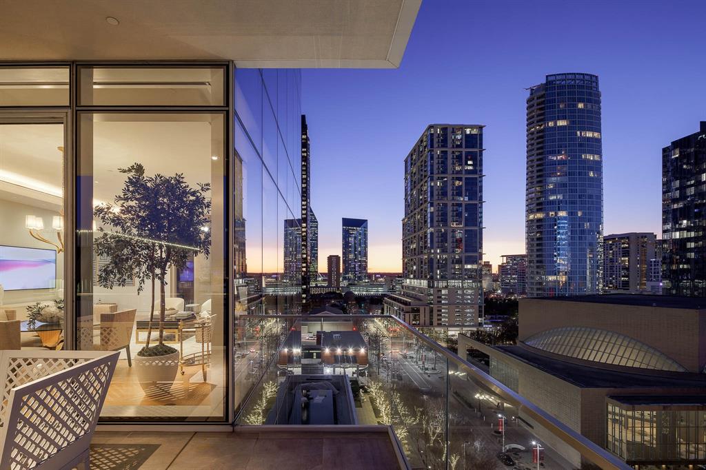 Step into a world of unparalleled luxury and sophistication with this stunning 2-bedroom, 2.5-bath residence nestled in one of Dallas' most prestigious high-rises. Located in the vibrant heart of the Dallas Arts District, this fully furnished masterpiece boasts gracious 11-foot ceilings and expansive floor-to-ceiling windows, granting you a front-row seat to breathtaking views of the cityscape and the surrounding arts district. The interiors, curated by the renowned designer Emily Summers, feature the highest quality finishes, including a Bulthaup kitchen, Gaggenau appliances, Dornbracht fixtures, and Lutron shades. The WELL and LEED Certified building provides residents with multilevel air filtration and ventilation, offering numerous health benefits. A neutral finish palette of rich materials such as French oak, Caesarstone quartz, and white marble creates a serene backdrop, allowing you to personalize your home effortlessly. Indulge in the luxury of a spacious private terrace, 24-7 valet, and on-site concierge services, all designed to cater to your every need.