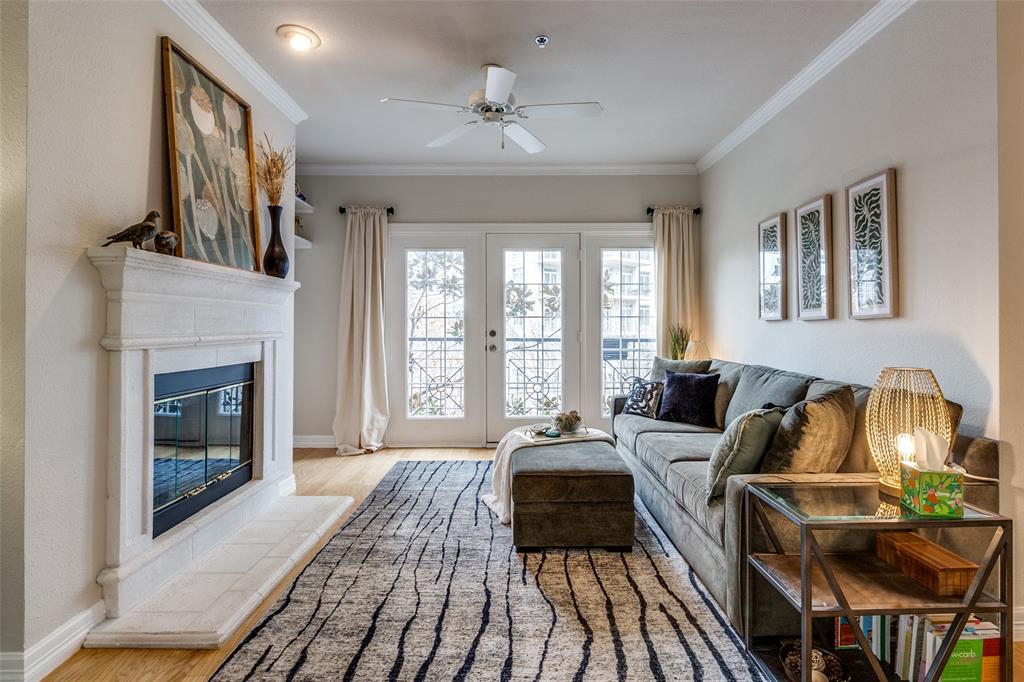 Spacious living area with fireplace.
