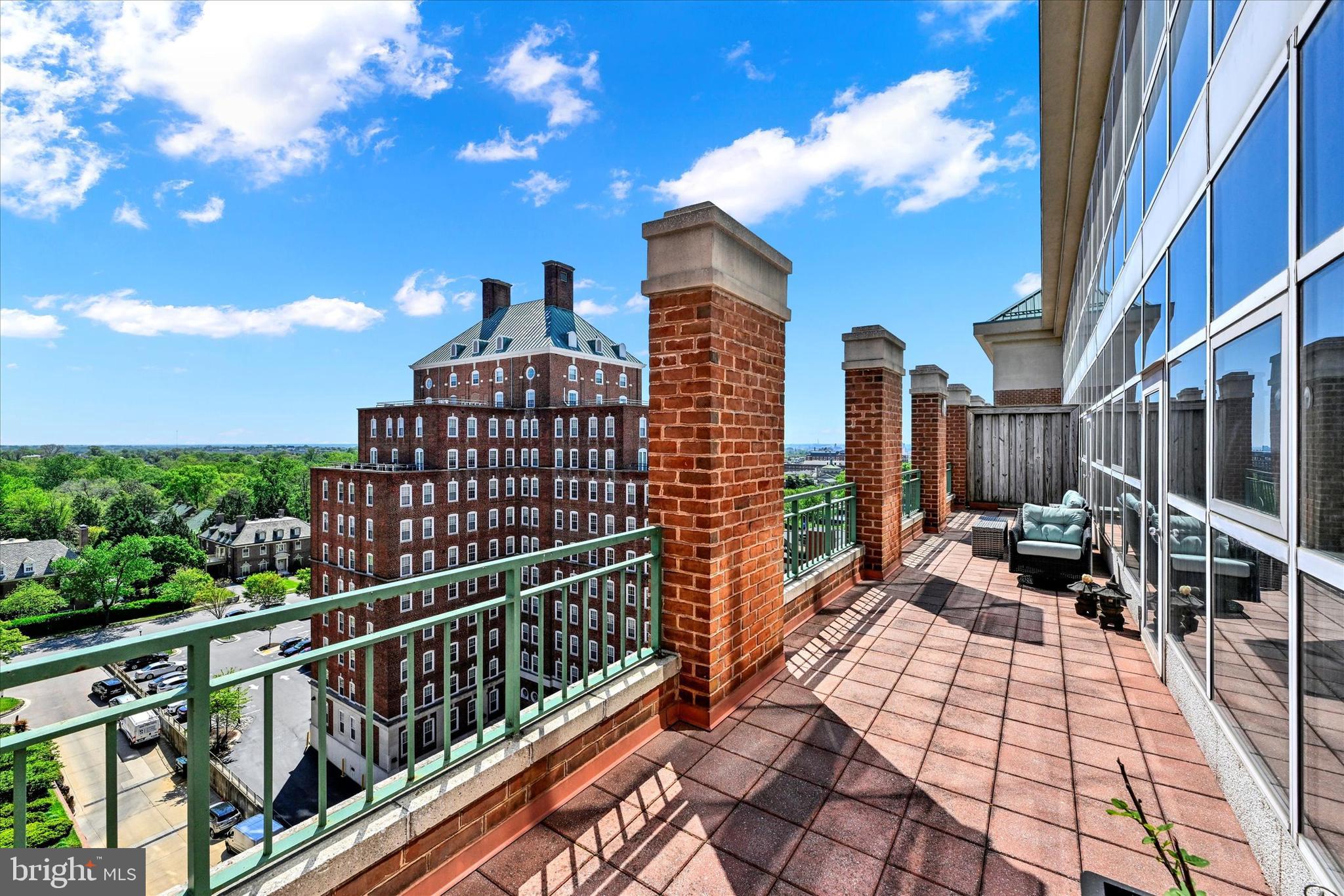 Rarely available two-level penthouse unit in The Colonnade with a double height entry foyer on the main living level. A dramatic wall of windows beyond the curving stairway gives access via three rooms to a large terrace that spans the expanse of the east side of the unit. The main level comprises living, dining, kitchen and laundry spaces south of the foyer, and a den/bedroom and a full bath to the north. The upper level, accessible from both inside the unit and via an entry door from the 11th floor hallway, includes a bedroom with an ensuite bath and multiple closets on the north side and a large primary suite with an expansive ensuite bath and a birds eye maple walk-in closet remodeled by the current owner, a secondary double closet, and a spacious finished loft.