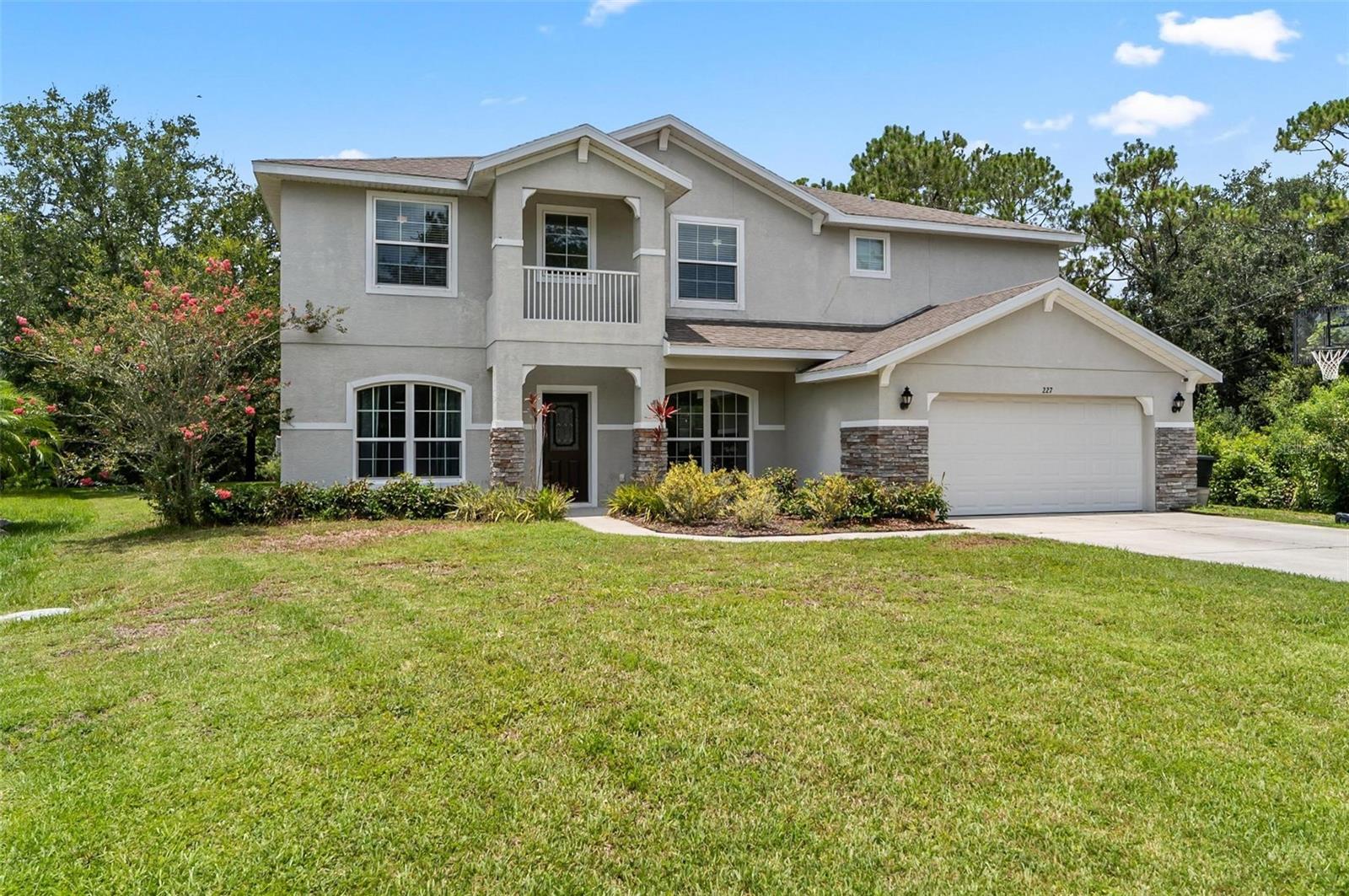 Short Sale. Short Sale: Rare 5 Bedroom Home on Freshwater Canal in Desirable Indian Trails! Welcome to this rare find in the heart of Indian Trails a beautifully maintained 5 bedroom, 3 bathroom home located on a peaceful freshwater canal with preserved land directly behind it, offering privacy and nature views that are hard to find in Palm Coast. Built in 2016, this spacious home boasts over 3,200 square feet of living space and feels brand new with fresh paint on the first floor and brand new flooring upstairs. The open concept floor plan is ideal for entertaining, flowing seamlessly from the expansive living area to the covered lanai and large inground pool your own private retreat. The gourmet kitchen features 42” cabinets, granite countertops, stainless steel appliances, and a huge walk in pantry perfect for cooking and hosting with ease. Enjoy high-tech living with a dual-zone surround sound system and 4 rooms hard wired for high speed internet. Perfect for working from home or streaming with ease. The primary suite is a true sanctuary, featuring tray ceilings, a cozy sitting area, and a spa-like bathroom with a massive walk in closet and hidden room, plus an upgraded garden tub for ultimate relaxation. Additional highlights include an oversized 2 car garage with ample room for storage and tools, and a location that’s just minutes from top rated schools, shopping centers, restaurants, and banks. Don’t miss your opportunity to own this one of a kind property in one of Palm Coast’s most sought after neighborhoods!