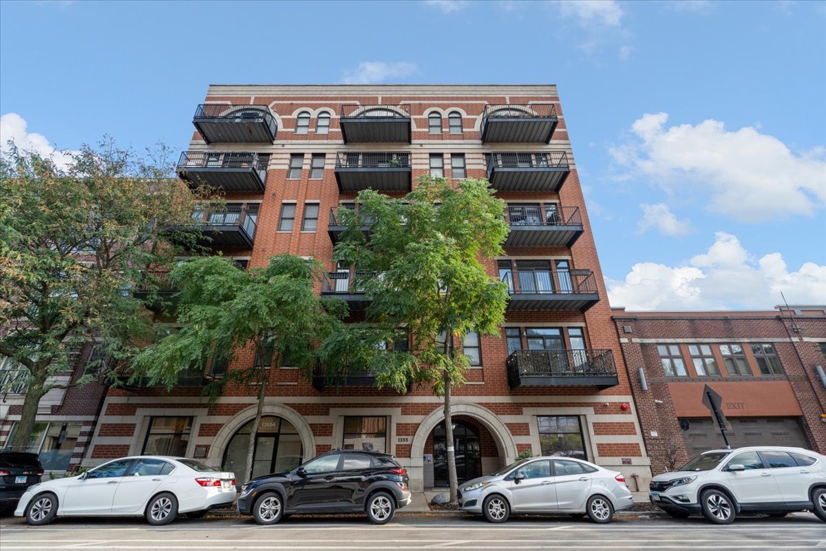 The GEM you have been waiting for!! A West Loop Showstopper with 2600 sq ft PRIVATE WALKOUT TERRACE! Expand your living space at least 6 months out of the year. CHIC & SOPHISTICATED 3 Bed/2bath CORNER UNIT with premium upgraded living space throughout, High ceilings, custom white oak finish floors, and designer lighting from Circa, Lulu, and Georgia present this home masterfully. Open concept living/dining and luxury kitchen newly remodeled perfect for entertaining, White shaker cabinets with gold hardware, high-end stainless steel LG appliances, a large custom pantry with 5' wall, extended island, premium quartz countertops, stainless steel oversized sink with brass faucet and disposal, glazed handmade ceramic wall tiles, pendant lights by Thomas O'Brien for visual comfort. Primary bedroom with 3 custom closets and large ensuite bath with spa shower, separate soaking tub, and double vanity. Secondary bedrooms all have custom closets. The second bathroom newly remodeled with glazed Handmade Ceramic Wall Tile (45" High), white vanity with Carrara Marble counter, brass fixtures, and Herringbone Carrara Marble flooring. Full-size washer and dryer. The entire home has been professionally painted and complete with new woven wood cordless shades along with blackout curtains in all the bedrooms and linen drapes in the living room. Get ready to spend the summer on your breathtaking 2,600 sq ft premium finished private terrace. (3,000sqft total) Including a pergola offering not only privacy but an extension of your living space. Like everything else in this home this deck has been masterfully built with 3 layers - plastic, pre-treated wood and Trex along with Storage Shed (8 ft x 6ft x 6ft) painted to match Trex decking. Treated and professionally power washed limestone on the entire deck. Building offers a rooftop deck with incredible 360 degree views! TWO CAR - tandem heated garage parking spaces are included in the price as well as, a 6' x 8' storage cage adjacent to parking space. Conveniently located near 90/94, mins from the best parks, the highly sought after Skinner Elementary, shopping, top Fulton Market and Randolph restaurant row and vibrant nightlife.  Welcome home!