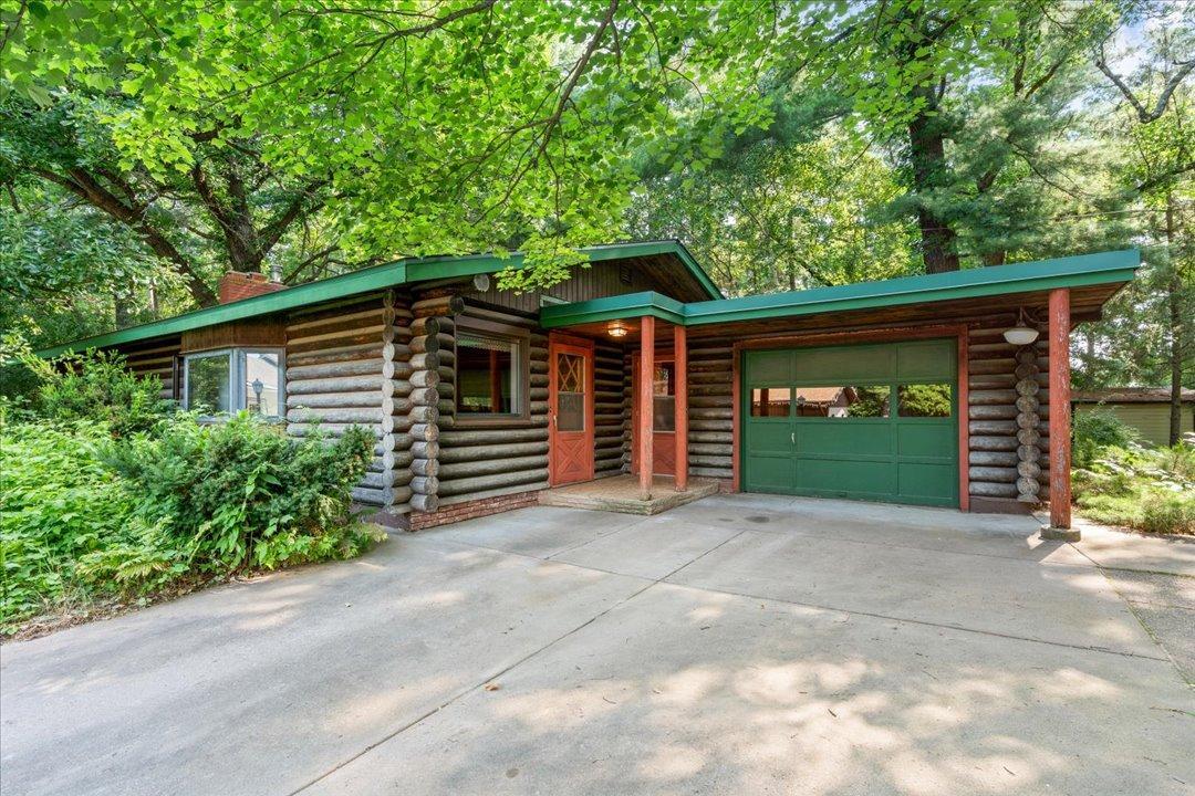 This authentic Log Cabin home was crafted with Lodgepole Pine harvested form the Rocky Mountains, showcasing timeless craftsmanship rarely found today. As a Model Log Home, it stands as a true gem; rich in character, solid log construction, and filled with potential. Whether you're looking to restore its original charm or enhance it with modern updates, this property offers a unique opportunity to own a piece of classic cabin architecture. This property sits conveniently in town, yet offers a remarkable sense of seclusion and privacy tucked within the trees. This property is in close proximity to schools, employment, shopping, and the Pine Grove Zoo.