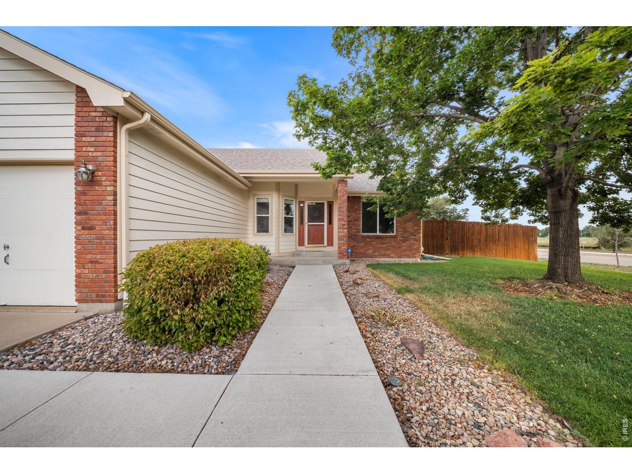 Welcome to this exceptionally well-maintained ranch-style home in desirable English Ranch, where pride of ownership is evident throughout. From the moment you enter, you'll appreciate the open and airy floorplan with soaring vaulted ceilings, abundant natural light and comfortable living spaces designed for everyday living and entertaining. The spacious great room is anchored by a fireplace and architectural art niches, while the expansive eat-in kitchen offers an abundance of cabinetry and counter space, a generous center island with breakfast bar, and plenty of room to gather. The private primary retreat features a five-piece bath and spacious walk-in closet, while the secondary bdrms are thoughtfully positioned on the opposite side of the home for added privacy. A formal dining room just off the entry provides additional flexibility and could easily serve as a living room, home office or other adaptable space. One of the home's most appealing additions is the three-season sunroom overlooking the backyard and adjoining greenspace-a wonderful spot for morning coffee, casual meals or simply enjoying the peaceful setting (the sunroom sq ft is in addition to the sq ft listed in the MLS). The finished recreation room in the basement adds valuable living space, while approximately half of the lower level remains unfinished, providing exceptional storage, peace of mind with a radon mitigation system already in place, and excellent future potential. Rough-in plumbing is already set for an additional bath, making it easy to envision another bedroom, bath, fitness space or expanded recreation area. A rare three-car garage complete with durable epoxy flooring further distinguishes this property and provides plenty of room for vehicles, bikes, recreational equipment and clean, organized storage. The location can't be beat-with convenient access to neighborhood parks, schools, shopping, dining and everyday services, making it easy to enjoy all that Fort Collins has to offer.