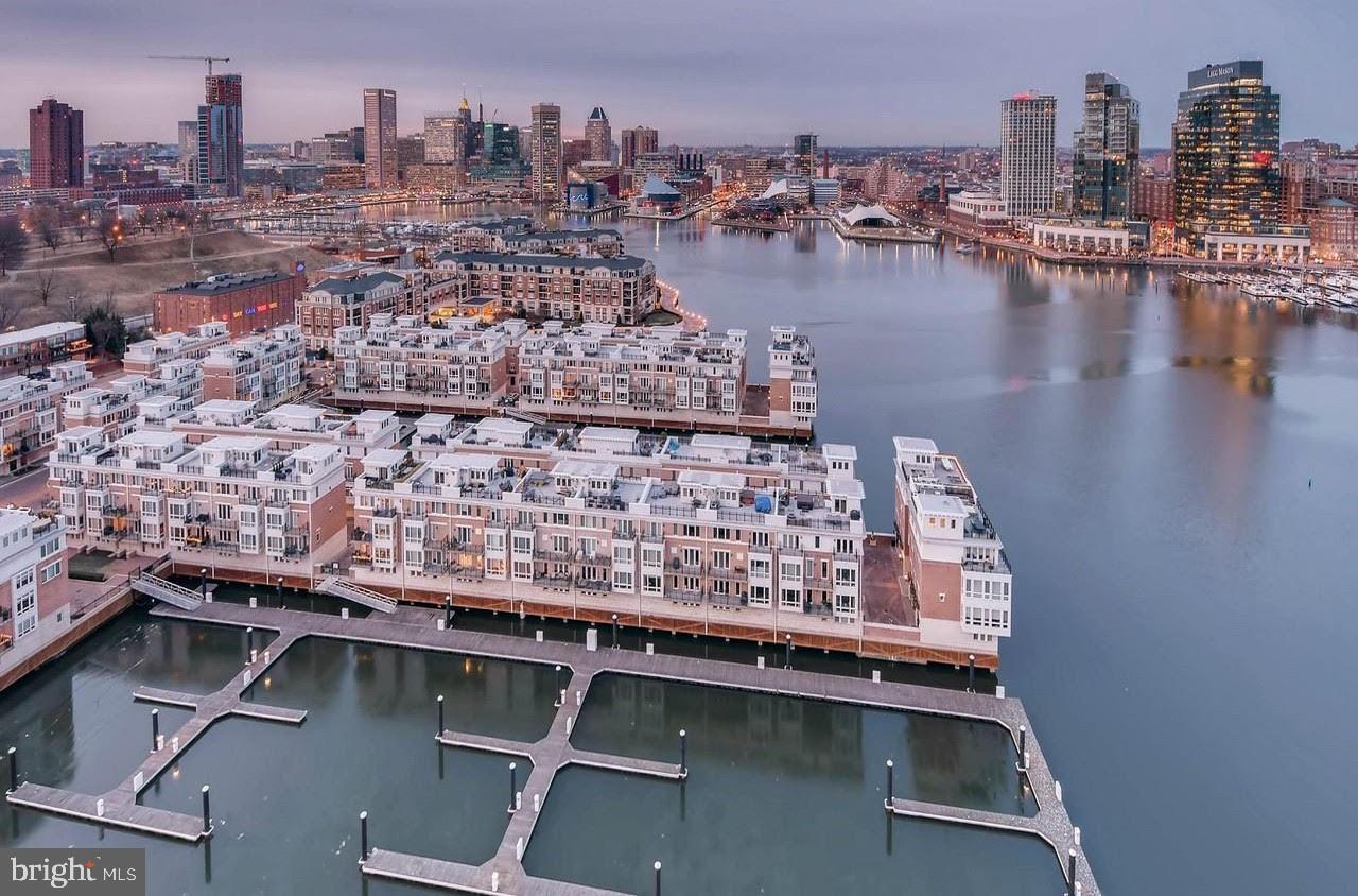 Million-dollar views! Wake up every day to mesmerizing harbor and city views from every room in your condo and from both balconies.   Such a fun place to call home and entertain guests in.  Great layout with two bedrooms and two baths on opposite sides of the condo allowing for privacy.   The primary bedroom has a large walk in closet and a separate shower and soaking tub.   Some of the updates include a renovated kitchen with wall removed to highlight the expansive water views the second you open the door to your condo. Updated appliances, wine fridge, granite counter tops, bathroom updates, updated hvac, hardwood floors, full size washer & dryer.  The condo building has a 24-hour front desk, 24-hour security, deeded garage parking, multiple gyms & two pools, dog park, meeting rooms, library, party rooms, waterfront lifestyle and a lot more.  Tons of amenities in and around the community including, cafes, deli, waterfront promenade, museums, water taxi, restaurants, transportation, I95,  grocery stores, pools, dog parks, marinas all at your convenience. When guests come to visit the Harborview Towers also has rentable guest suites, which certainly come in handy when entertaining.   Every unit has a storage unit as well.  Amazing location and waterfront lifestyle in the Inner Harbor, very good living, and very easy for commuting.  HOA fee $329.00, Special Assessment Fee $218.00, Condo Fee $1,426.90, Parking Fee $135.00. Total monthly amount: $2,108.90