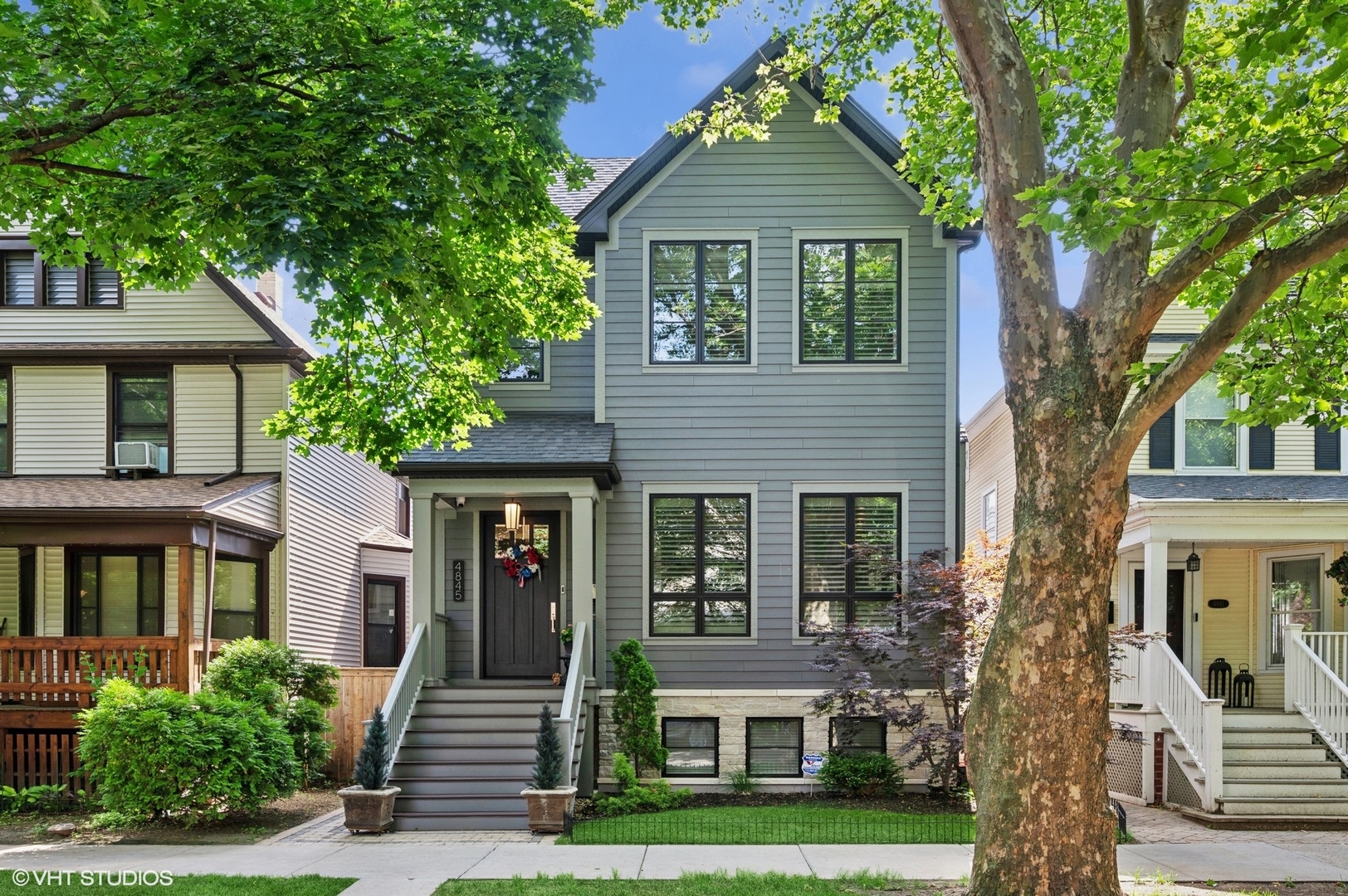 Gorgeous extra wide newer construction home in Linocoln Square on an oversized lot!  Impeccable finishes and floor plan with 7 bedrooms and 4 full & 2 half baths on a tree lined one way street.  The extra width of the lot allows for an amazing custom chef's kitchen, professional commercial grade SS appliances, huge oversized island, quartz counters & built in banquette. Adjacent open family room with WB fireplace & custom built-ins provides a perfect entertaining space. Upstairs offers 4 beds/3 full baths & a true laundry room. Luxurious master suite w/cathedral ceilings, marble bath, his/hers walk in closets. Lower level w/radiant heat, high ceilings, 3 beds/1.5 bths and large rec room with wet bar. Rear fully built out mudroom leads to yard with snowmelt brick paver patio, custom landscaping and lighting and a 3 car heated garage and roof top deck. Steps to Lincoln Square, Winnemac Park the El and Metra.  This home is better than brand new and there is absolutely nothing to do but move in.