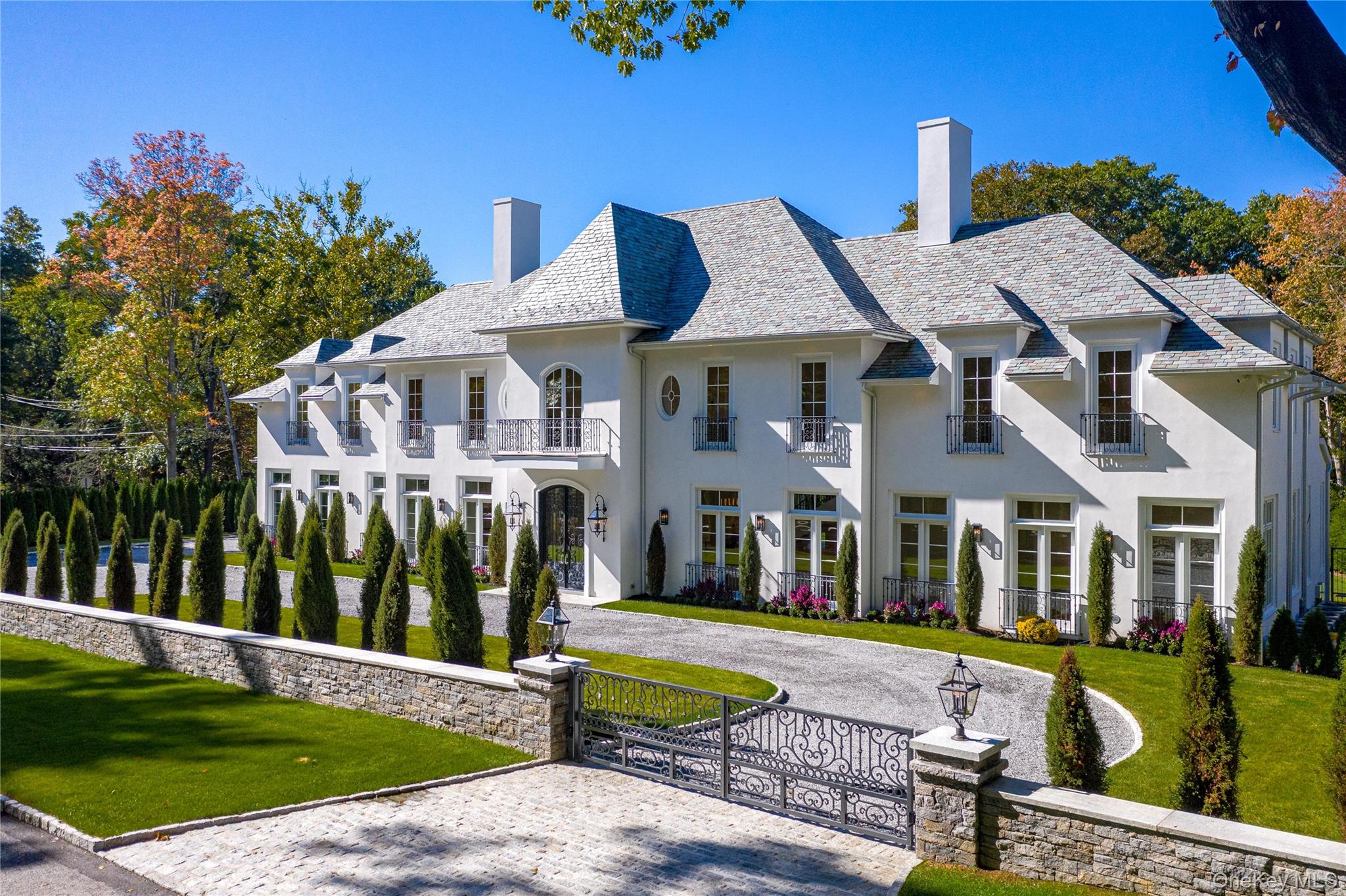 Discover Chateau isle de France in the middle of historic Lawrence Park West, Bronxville. Fall in love as you enter through the custom designed gates to find this brand new architectural masterpiece. Impeccable attention to detail, over 8600 SF w/ 5 br, 6 full & 1 half baths. Smart home technologies, (lynx) outdoor kitchen, heated pool & spa. Jaw dropping foyer w/ custom designed floating staircase, mill work, railings & front door. 1st flr features 12 ft. coffered ceilings, show stopping kitchen, library/family rm, living/dining rm w/ 1 of 3 custom designed fp mantles. Home office plus master w/ en-suite bathrm. 2nd level has 17 ft. ceilings, bonus family room w/ fp, sliding glass doors to deck, & elegant master suite w/ a closet & bathrm fit for royalty. 3 add’l brs, 2 bathrms & laundry complete the 2nd level. 4400 add’l SF in LL includes wet bar, wine cellar, movie theater w/ state of the art 4k projector, gym and maid’s quarters.  The entire house can be controlled w/ a touch of a button. Sonos system & stealth (invisible) Triad speakers hidden in the walls, infrared cameras, 2 car garage designed for a lift. Landscaped to perfection, low taxes, only 28 minutes to NYC. Additional Information:  Amenities:Marble Bath,Soaking Tub,Storage,ParkingFeatures:2 Car Attached,
