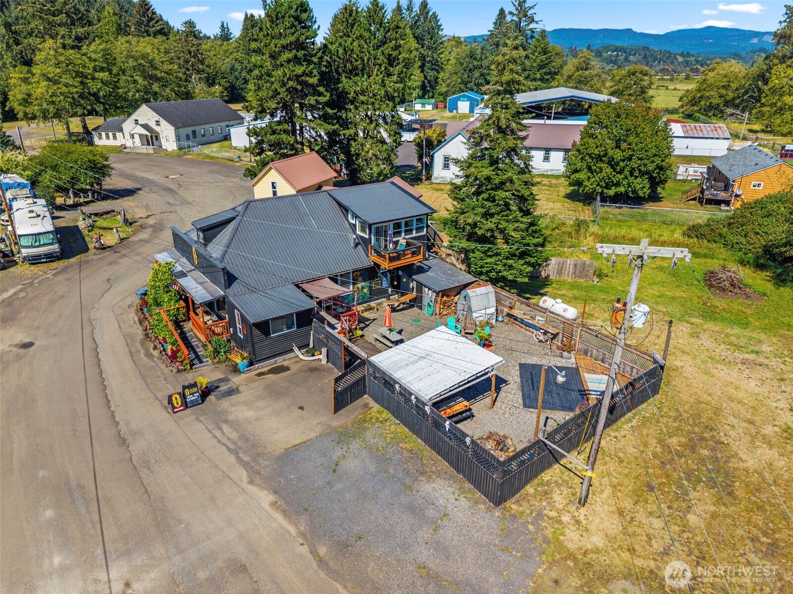 Here is your chance to continue “The O”! Historic Oasis Tavern in the friendly, picturesque town of Skamokawa is ready for its next chapter. Steeped in local lore & community spirit, this beloved gathering spot has been lovingly revitalized by its current owner, who has brought a steady, vibrant music scene back to its stage. The result? A jovial, quaint & groovin’ low-key bar w/roots as deep as the Columbia River itself. This is more than just a business—it’s a lifestyle. The O comes fully equipped, well maintained, & paired w/modernly refreshed and charming Saloon Apartment right on site! Imagine waking up to serene river views, walking downstairs to greet regulars & travelers alike, and ending your evenings with the ambience of live music fireside and laughter filling the air. Seller has lived onsite, has been on Air BNB - great income potential for short or long-term. Located in one of the most scenic corners of the Pacific Northwest, Skamokawa offers a rare blend of natural beauty, history, and small-town warmth. Lewis & Clark once passed through here during their legendary journey—nicknaming it “Smoke on the Water.” Now, you can write your own story in this remarkable place. Fishing, kayaking, paddle boarding, hiking, hunting, birdwatching & more! Whether you’re looking to LIVE, WORK, and PLAY in a close-knit community or invest in a turn-key business with endless charm, the Oasis Tavern is your ticket to a truly unique way of life. The river is calling—will you answer?